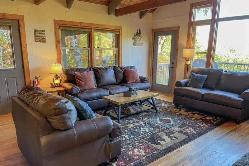 Leather seating around the stone fireplace