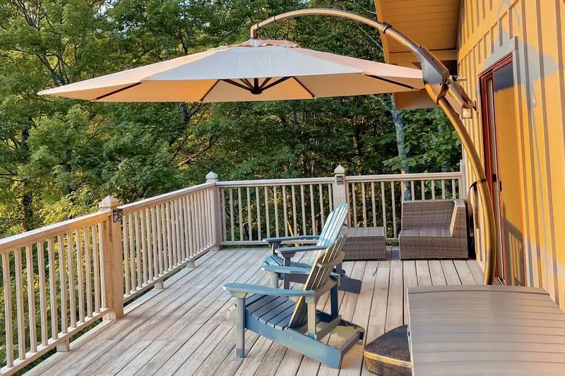 Main deck with umbrella seating and outdoor dining