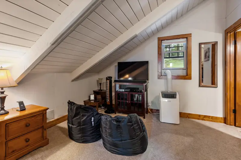Bunk room gaming corner with TV and Xbox