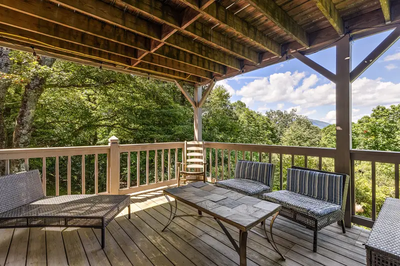 Covered lower deck with lounge seating