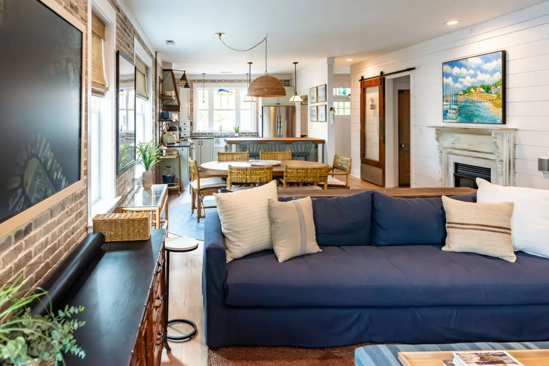 The heart of this high-end Morehead City vacation home, the spacious living area offers an open floor plan and ample seating for spending time together in style and comfort.