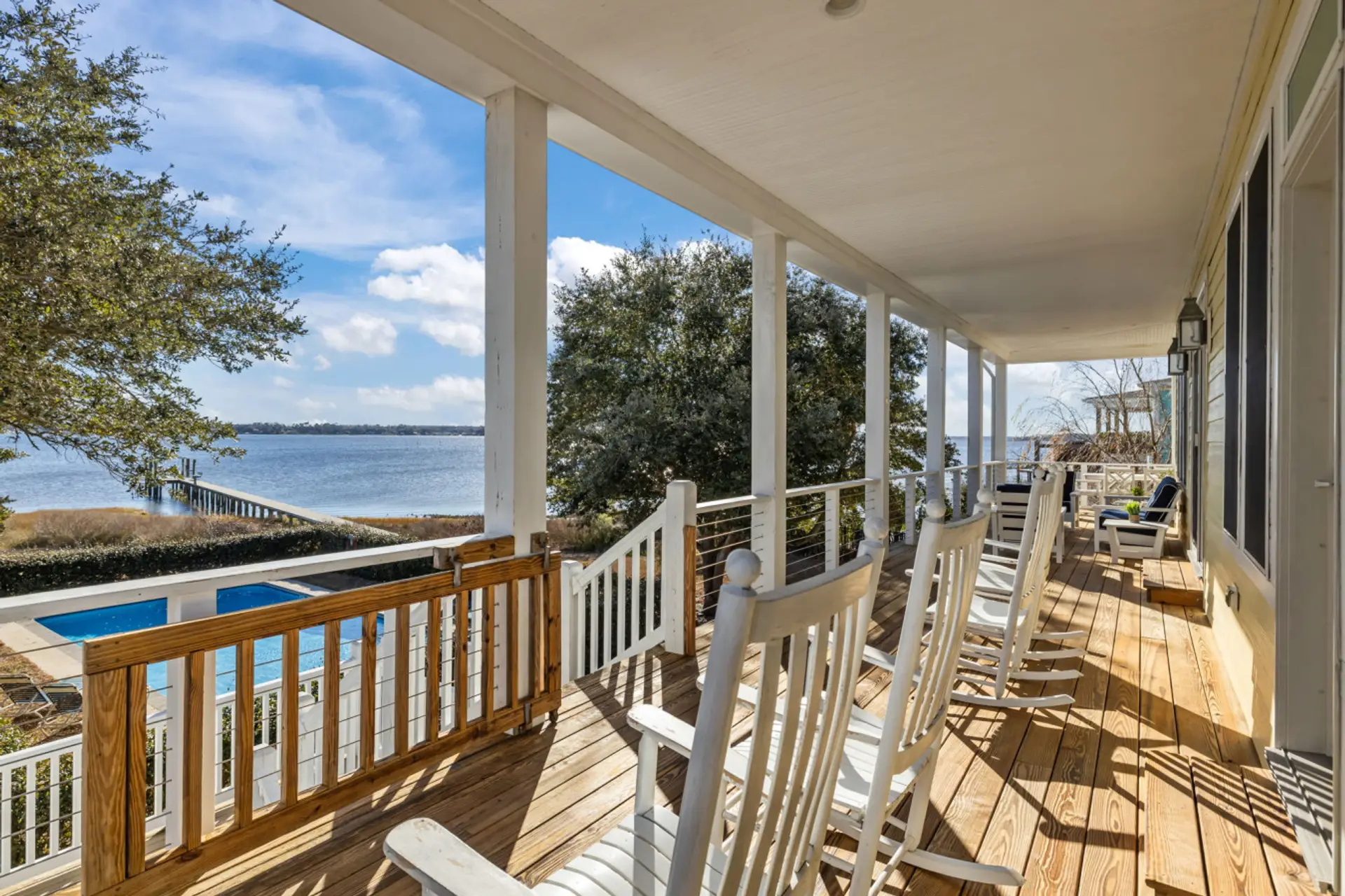 Stunning coastal waterfront home with private pool and dock and lift