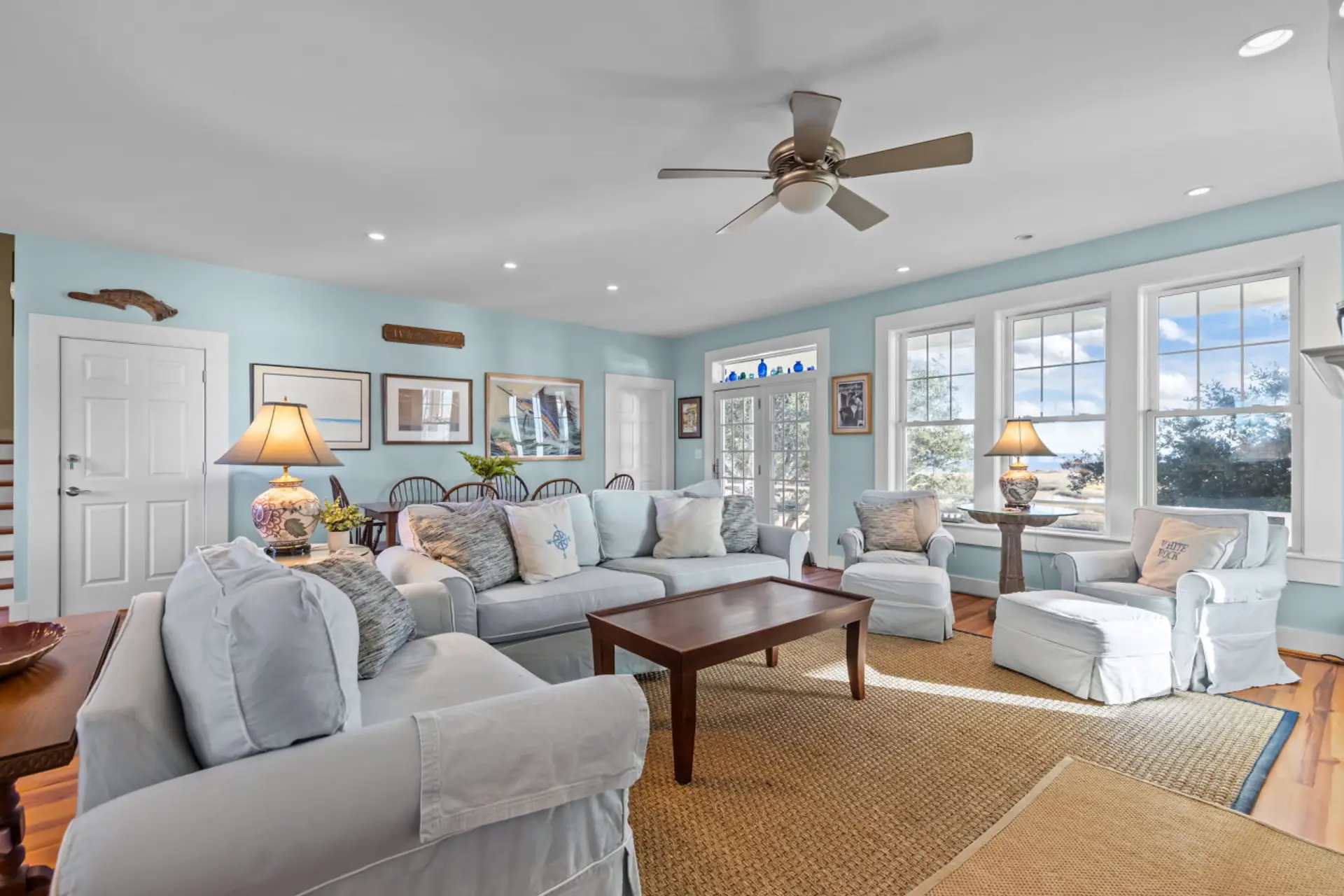 Calm coastal vibes in this spacious living room with water views