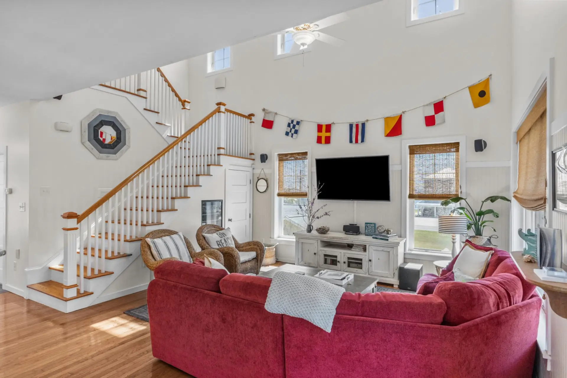 Gorgeous living space with plenty of comfortable seating and water views