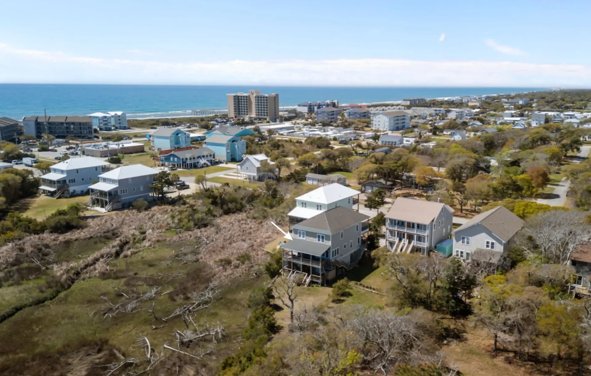The Marsh House is within walking distance of Atlantic Beach, where you can soak up the sun, sand + ocean breeze