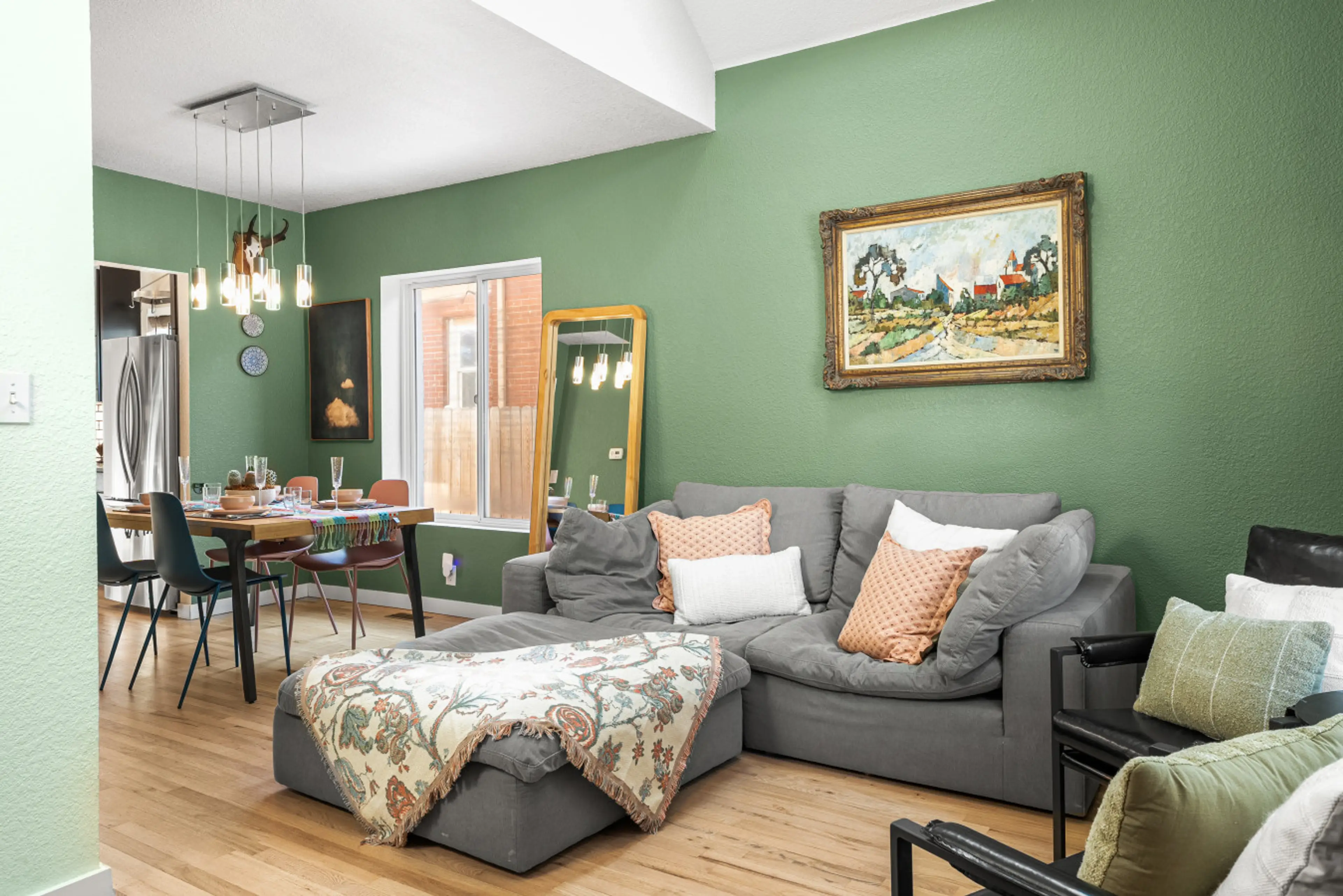 Upon entering you'll be greeted by vaulted ceilings, natural light, and the perfect couch to plop down on after a long day of traveling