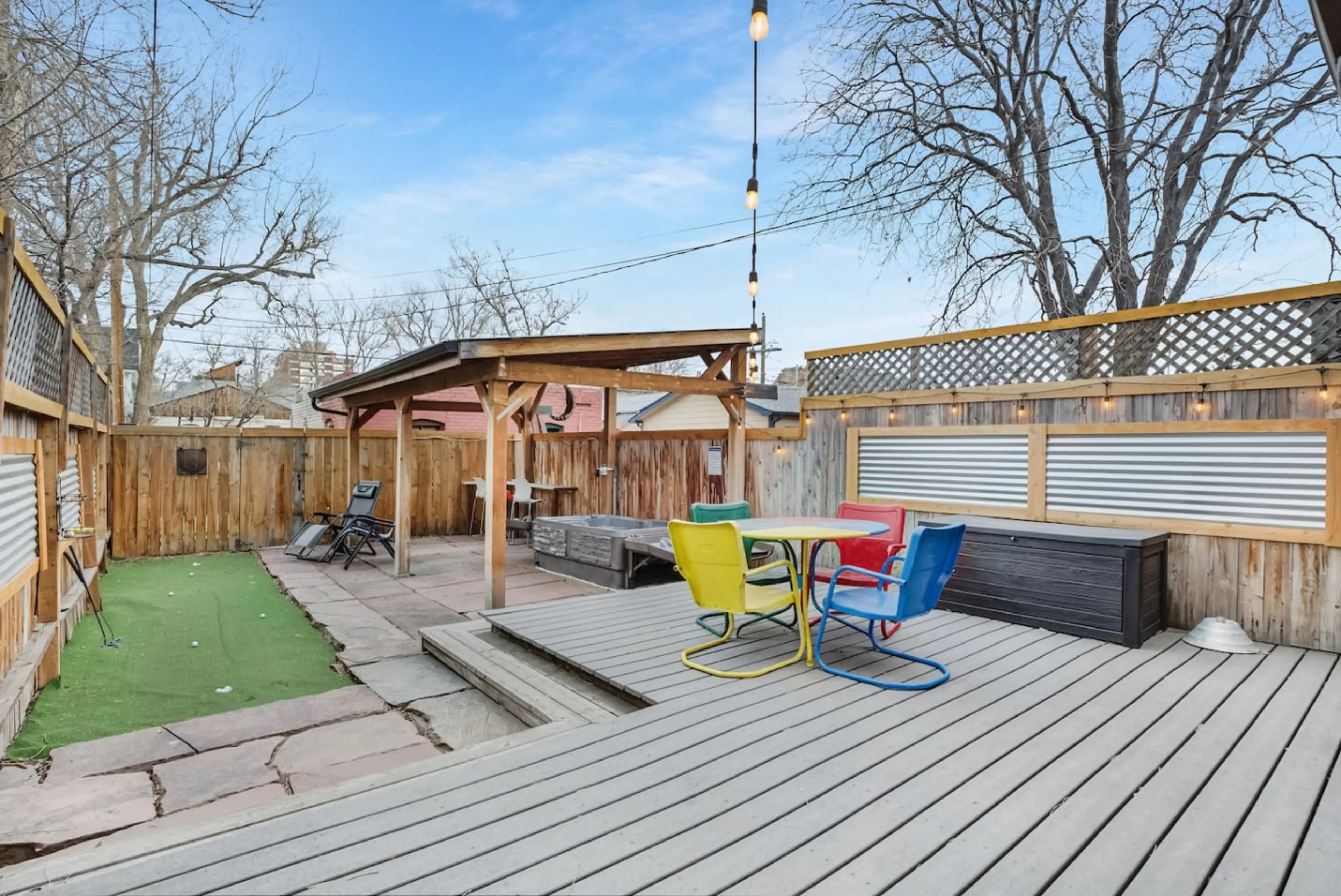 PuttPutt, 2-person hot tub, and a dining table for 4 make this the best backyard in Denver