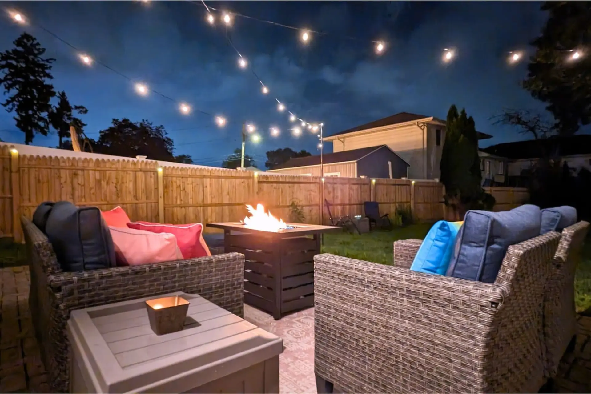 Embrace outdoor living no matter the season- or time of day- with a fire pit table, fresh sea air, and stunning skies.