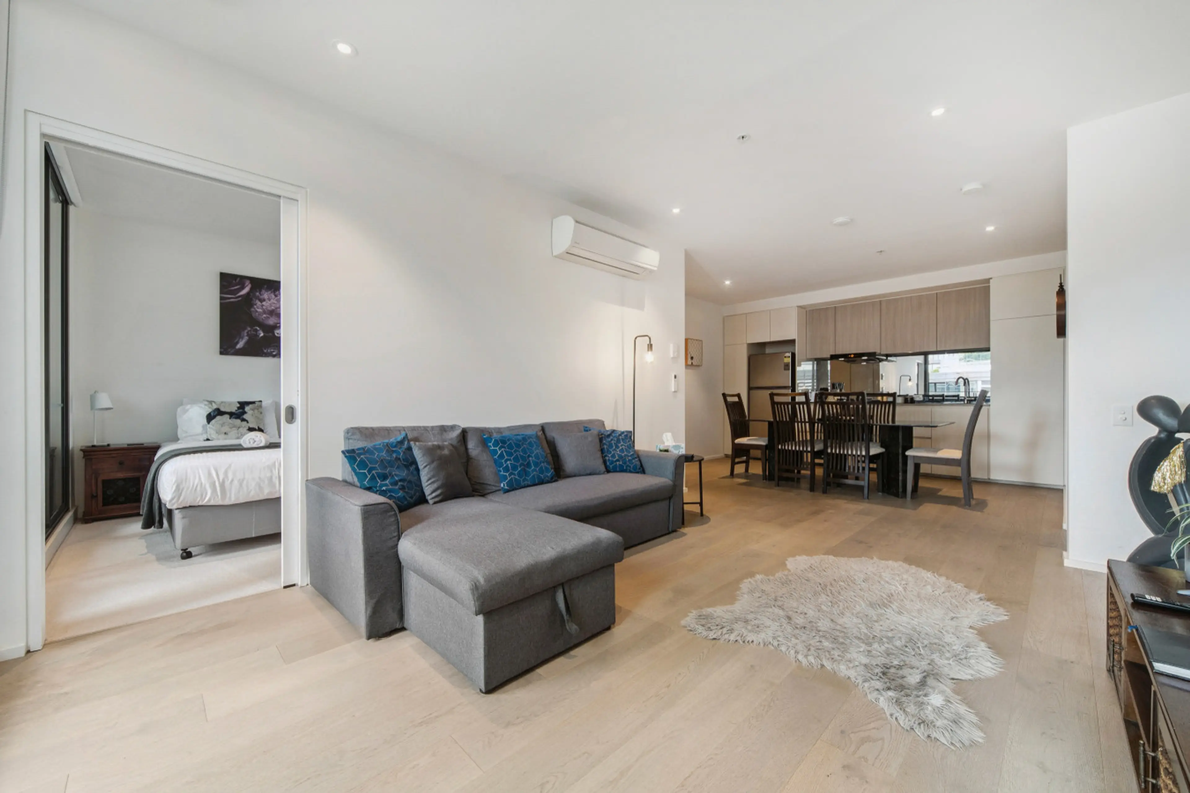 Open plan flows through to bedroom 2