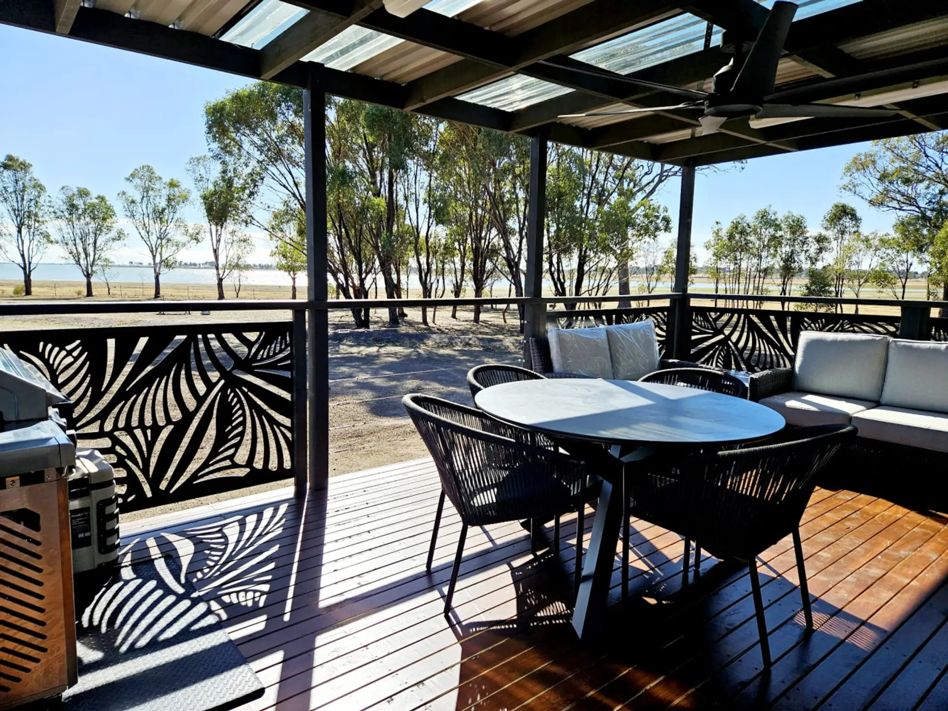 Wow factor large deck with comfortable outdoor furniture and views of Lake Waranga within walking distance.