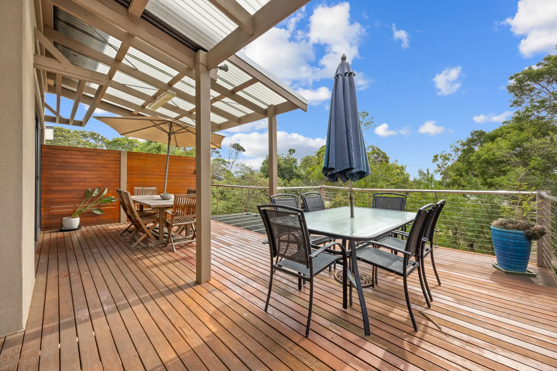 Huge private upper deck with double dining areas, ocean views, BBQ & Outdoor fridge.