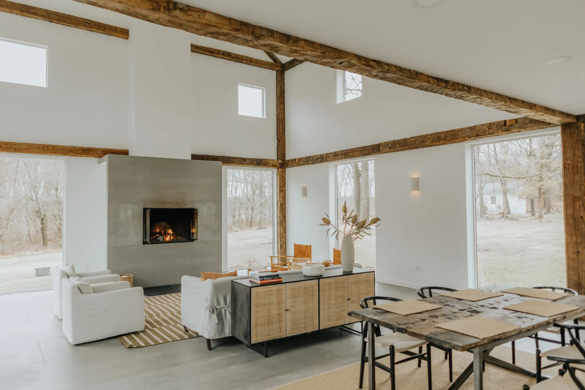 Bright and airy space with stunning views and a sleek fireplace for ultimate relaxation!