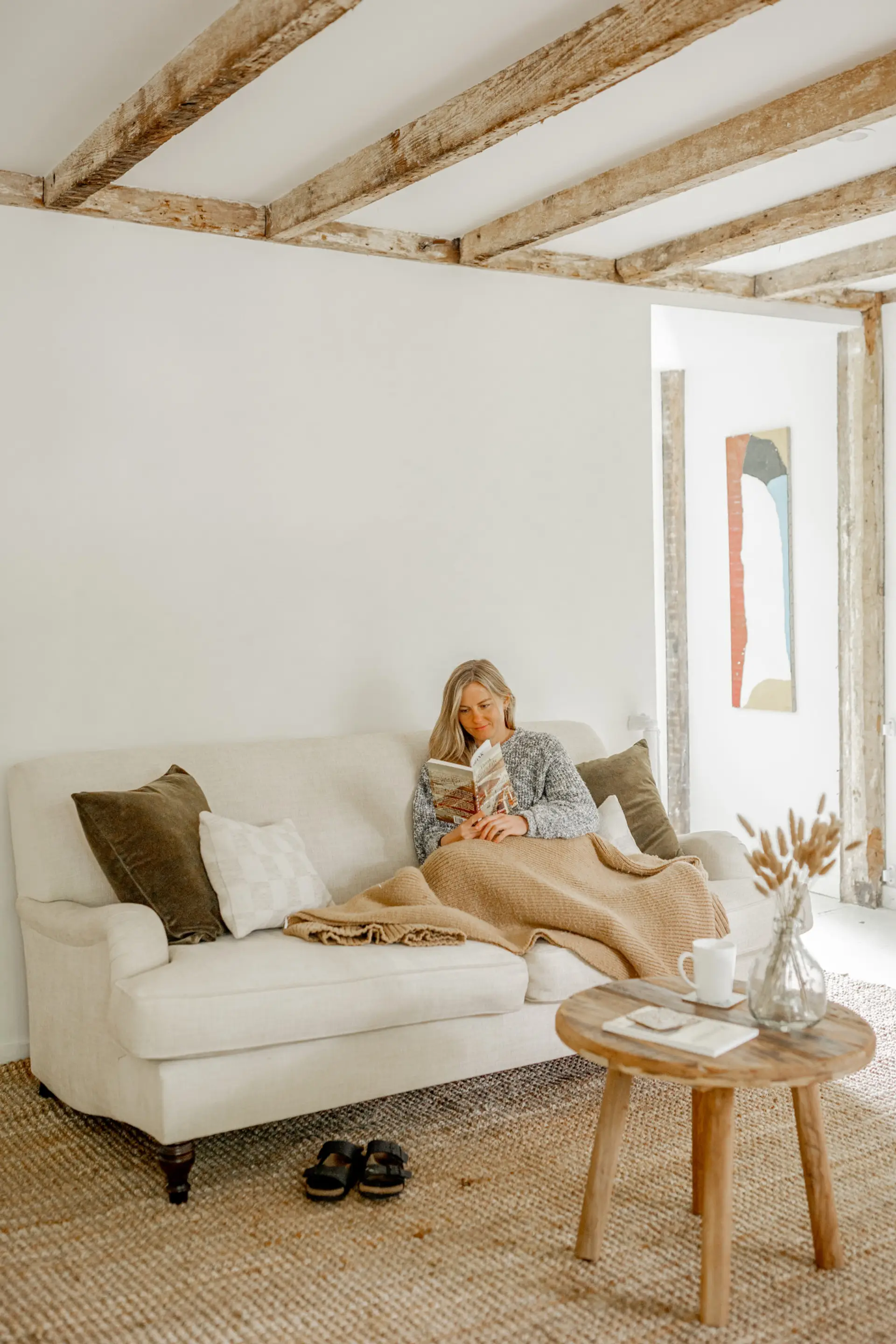 Living Room: Bright and inviting, perfect for lazy afternoons with a good book and a warm drink!