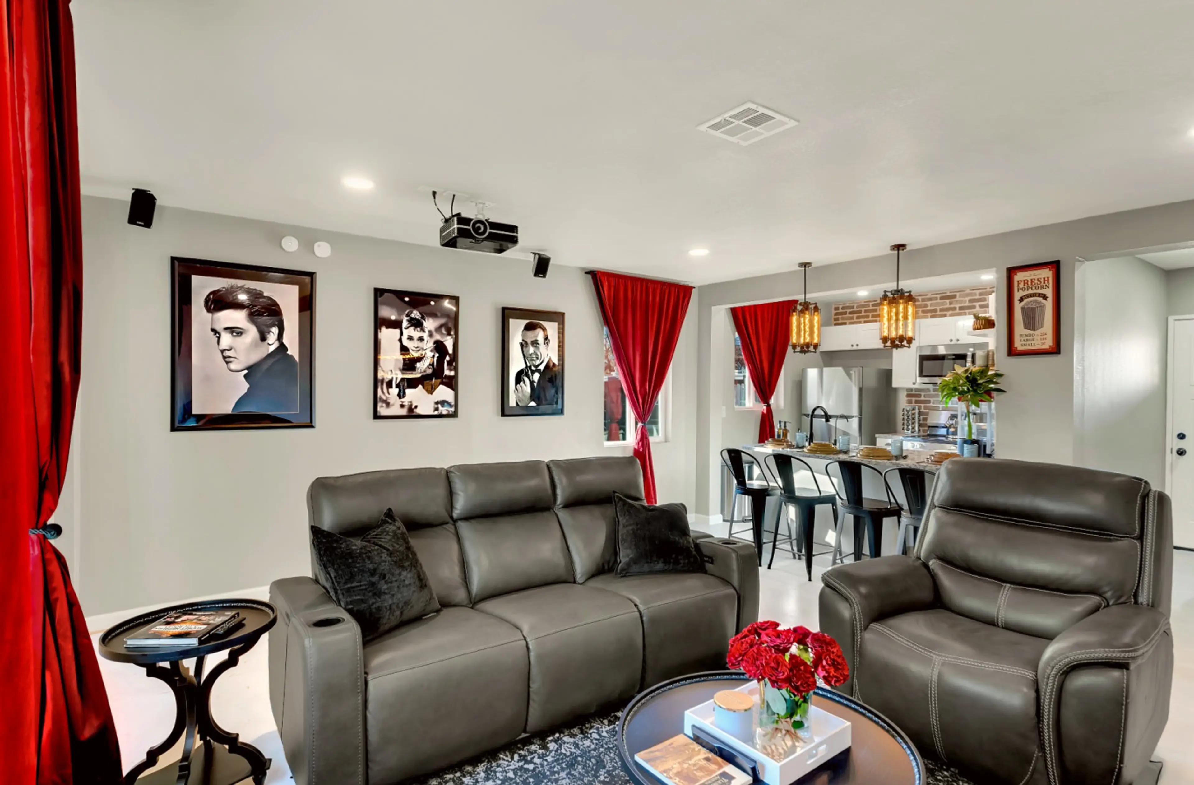 Experience vintage glamour with plush seating, bold decor, and inviting natural light!
