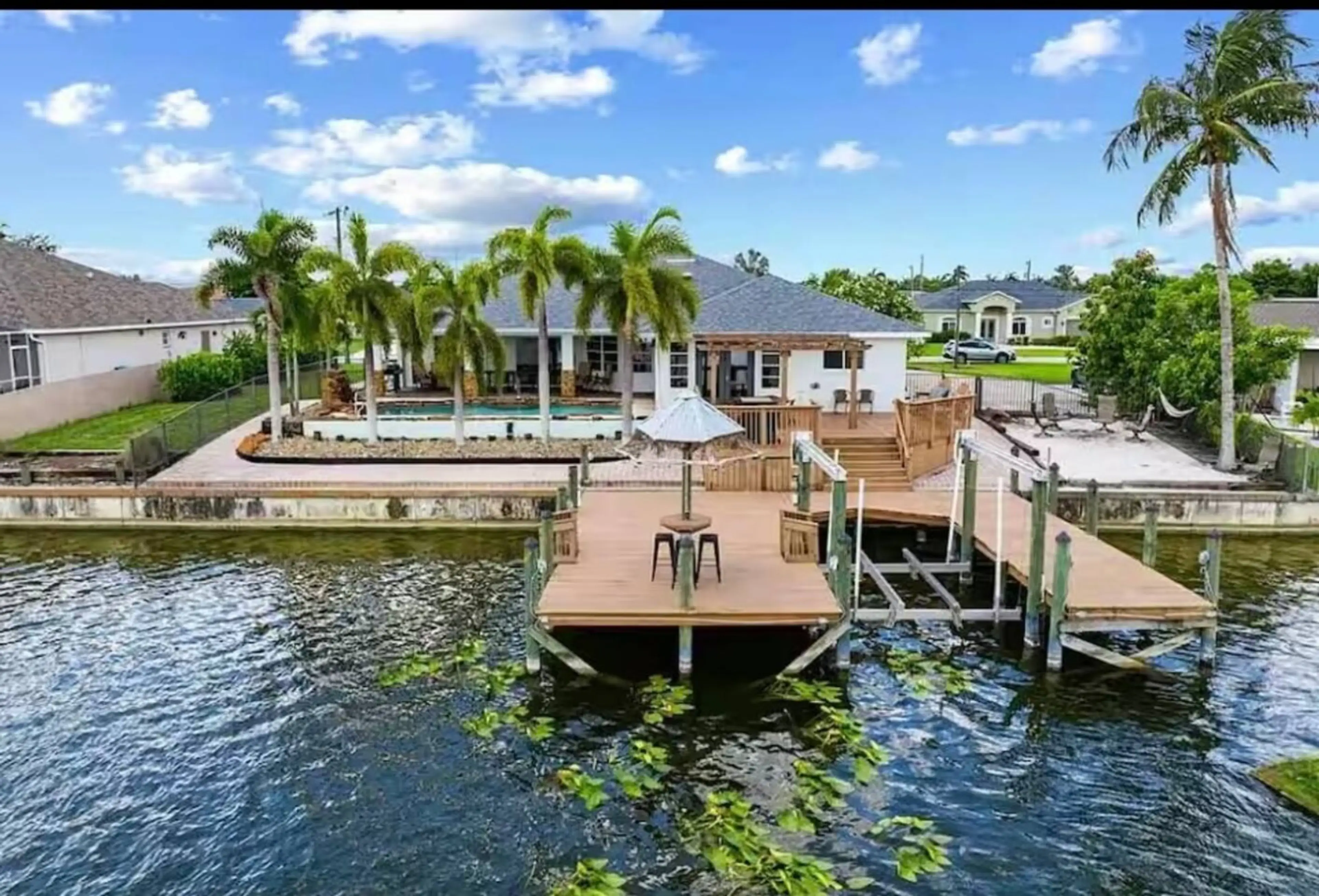 View of the home and dock from the canal