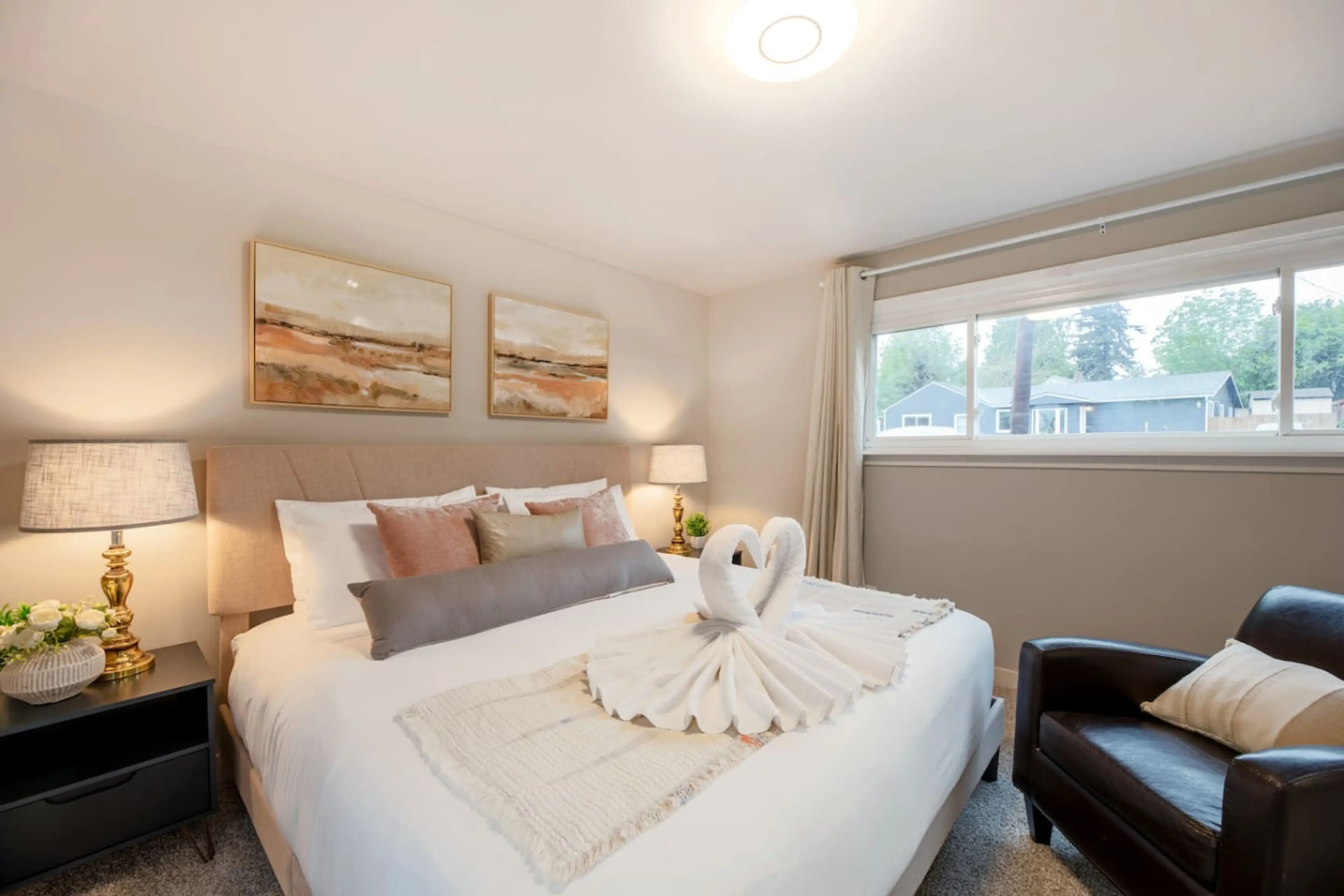 Experience a stay filled with personalized touches in our thoughtfully designed bedroom. Every detail, from the artwork to the decor, contributes to a uniquely welcoming atmosphere