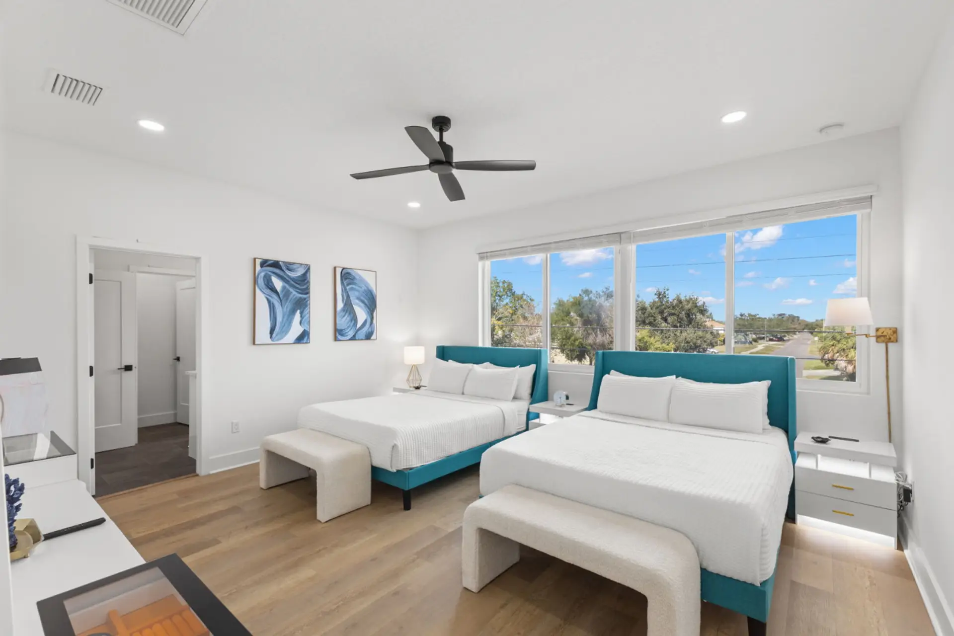 Master bedroom with 2 comfy queen beds and en suite bath