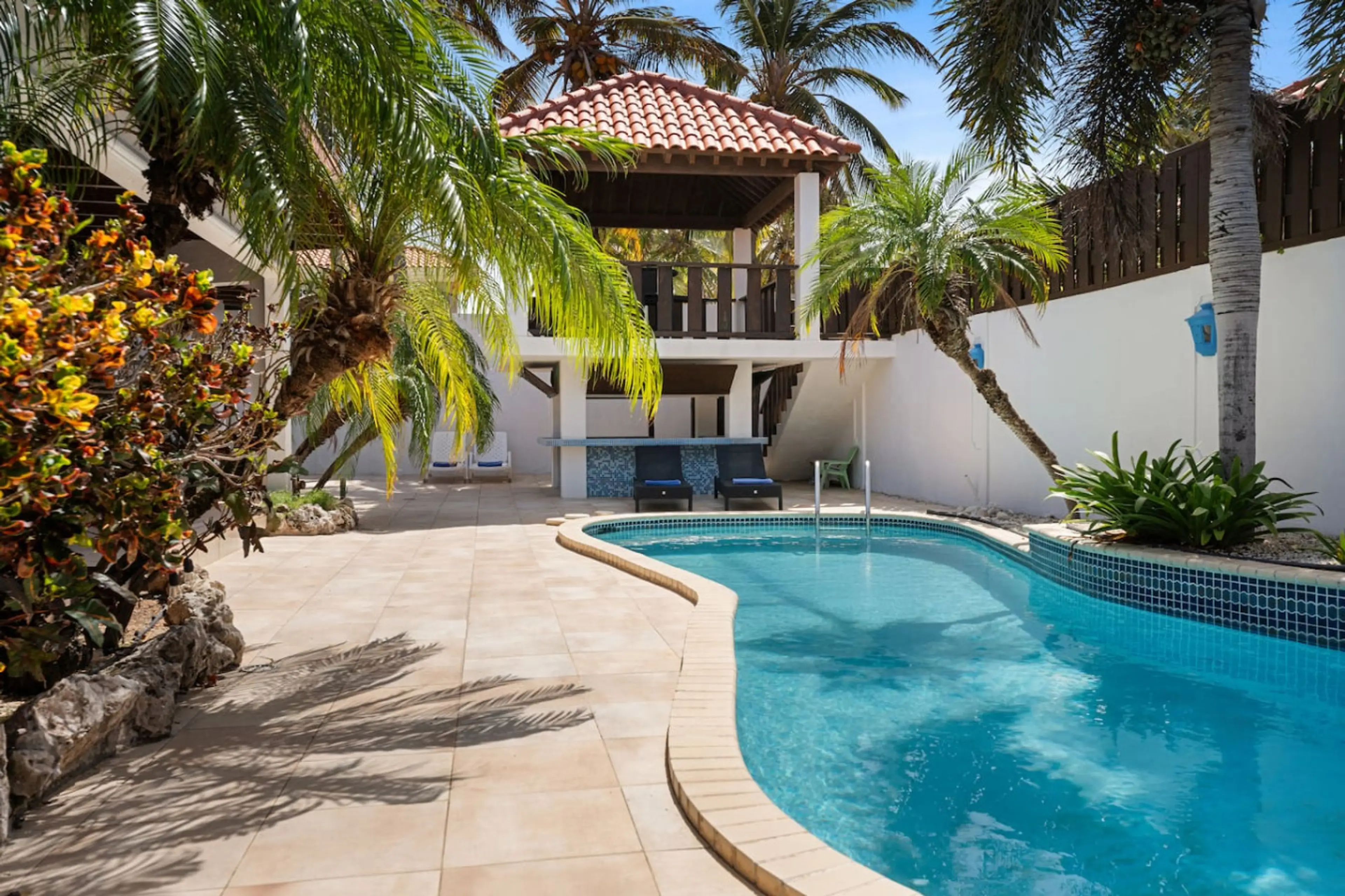 The sparkling private pool is the highlight of Villa Z, offering the ultimate place to cool off under the Caribbean sun.
