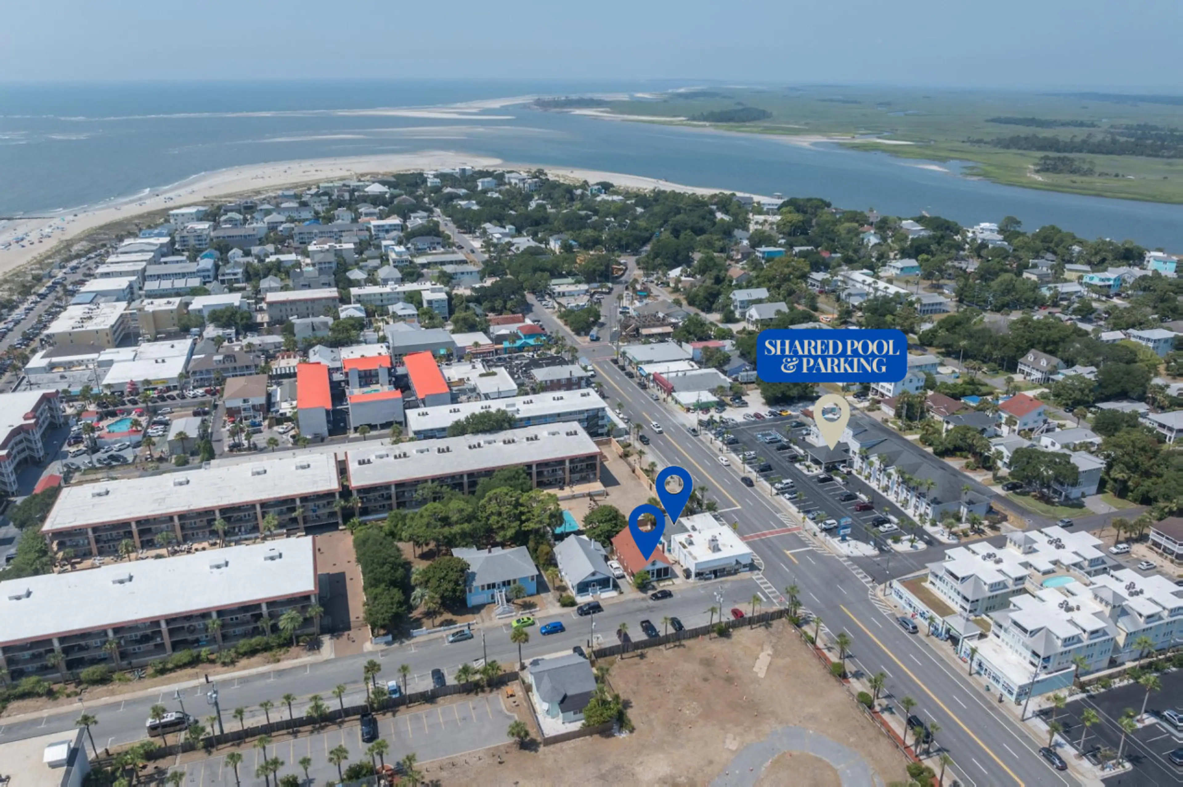Aerial View of Both Properties with Shared Pool Access and Parking Next Door at Admiral's Inn