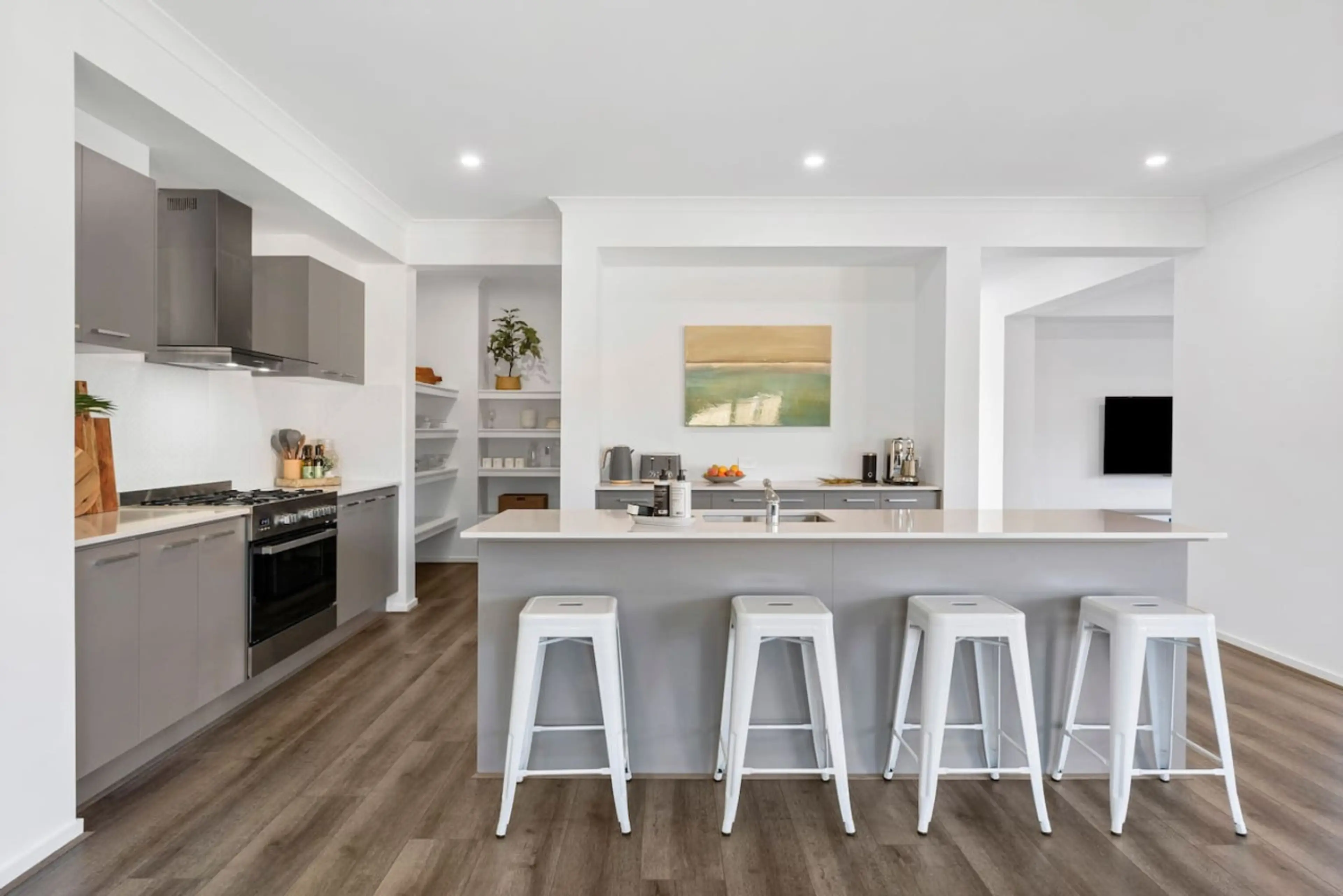 Spacious modern kitchen with breakfast bar.