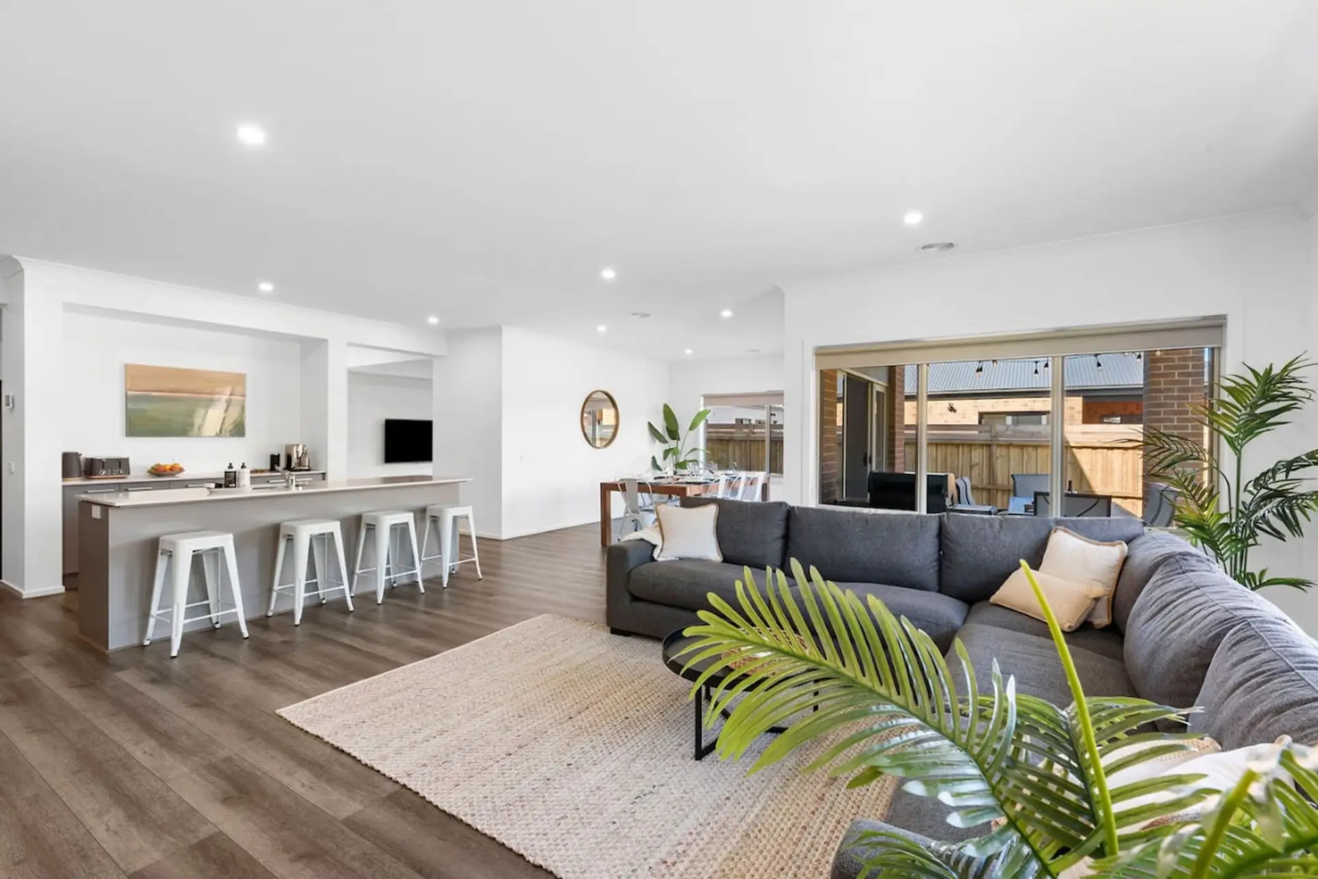 Bright open-plan living, dining, and kitchen space.