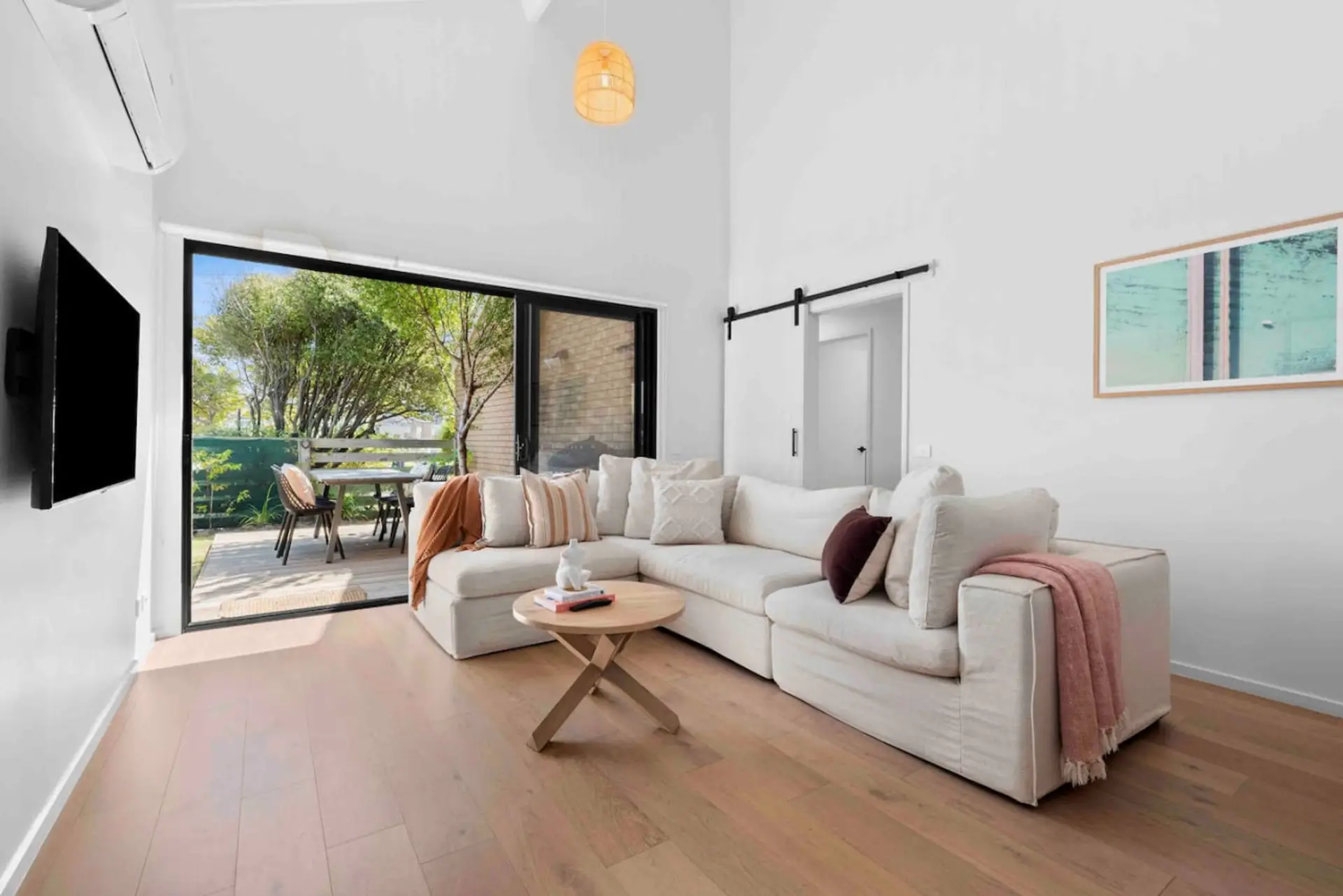 🛋️ Comfortable living area opening to outdoor patio