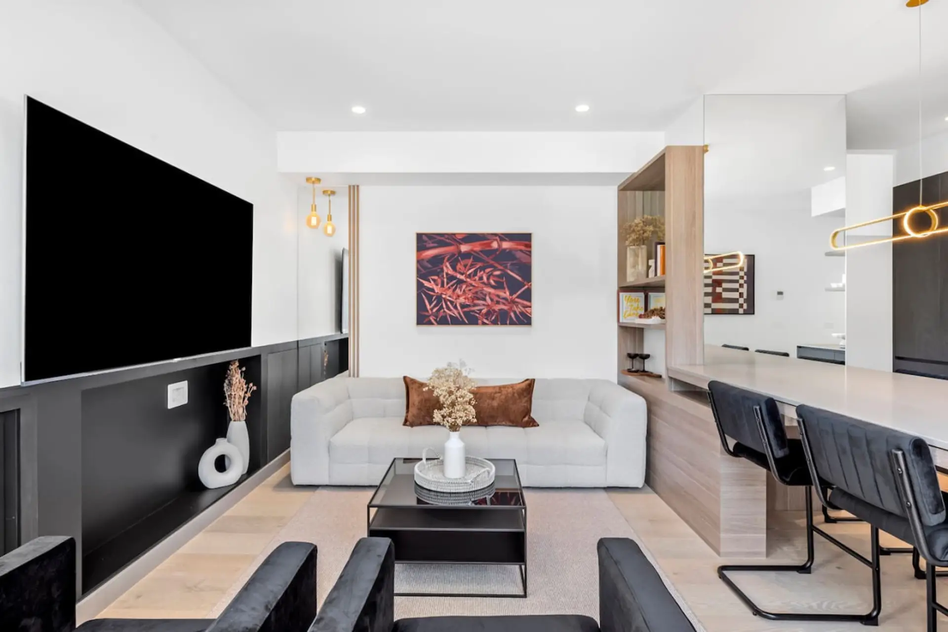 Modern lounge with smart TV and open-plan seating