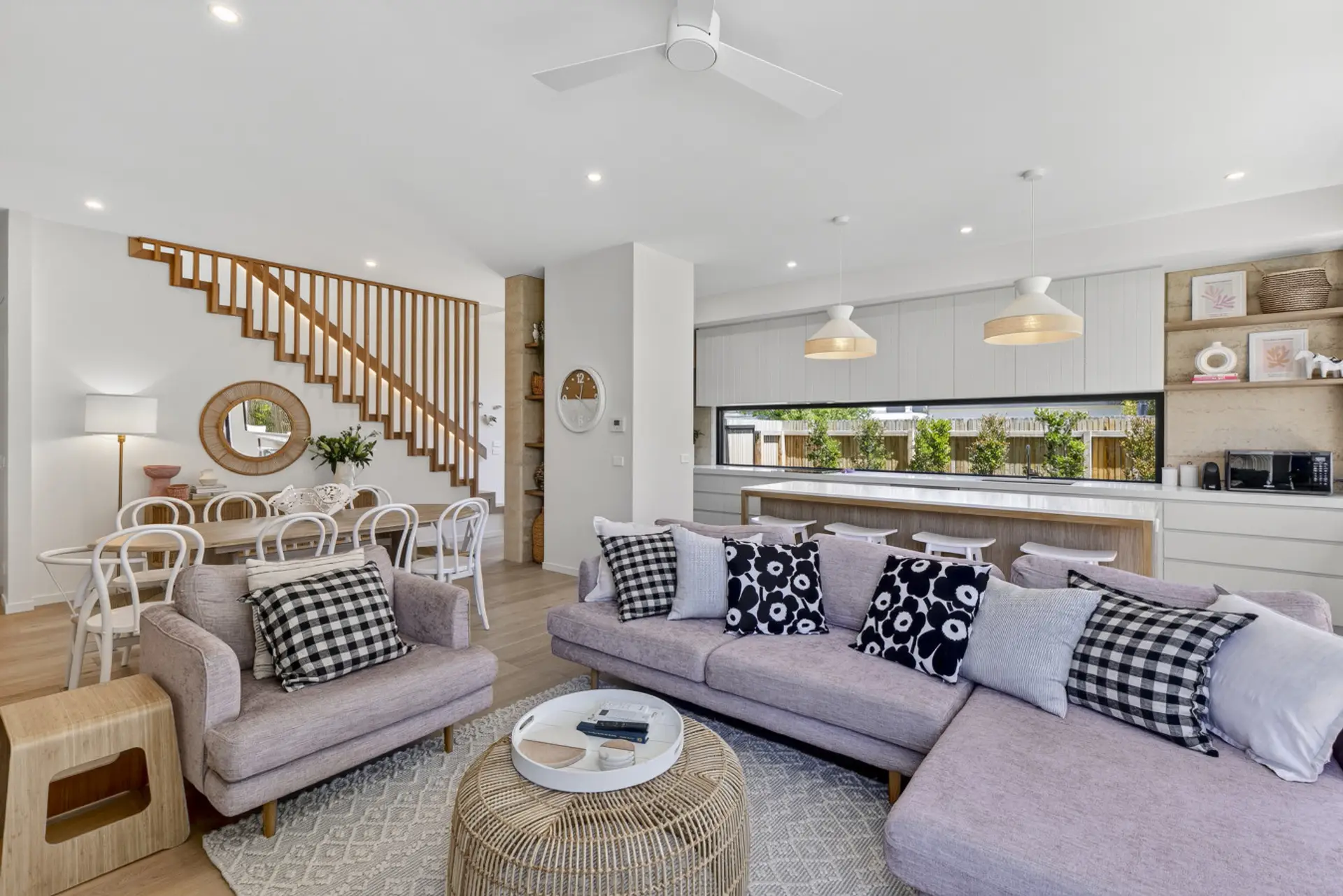 Open plan kitchen, living and dining overlooking the pool. Smart TV, gas log firepalce, heating, aircon and fans