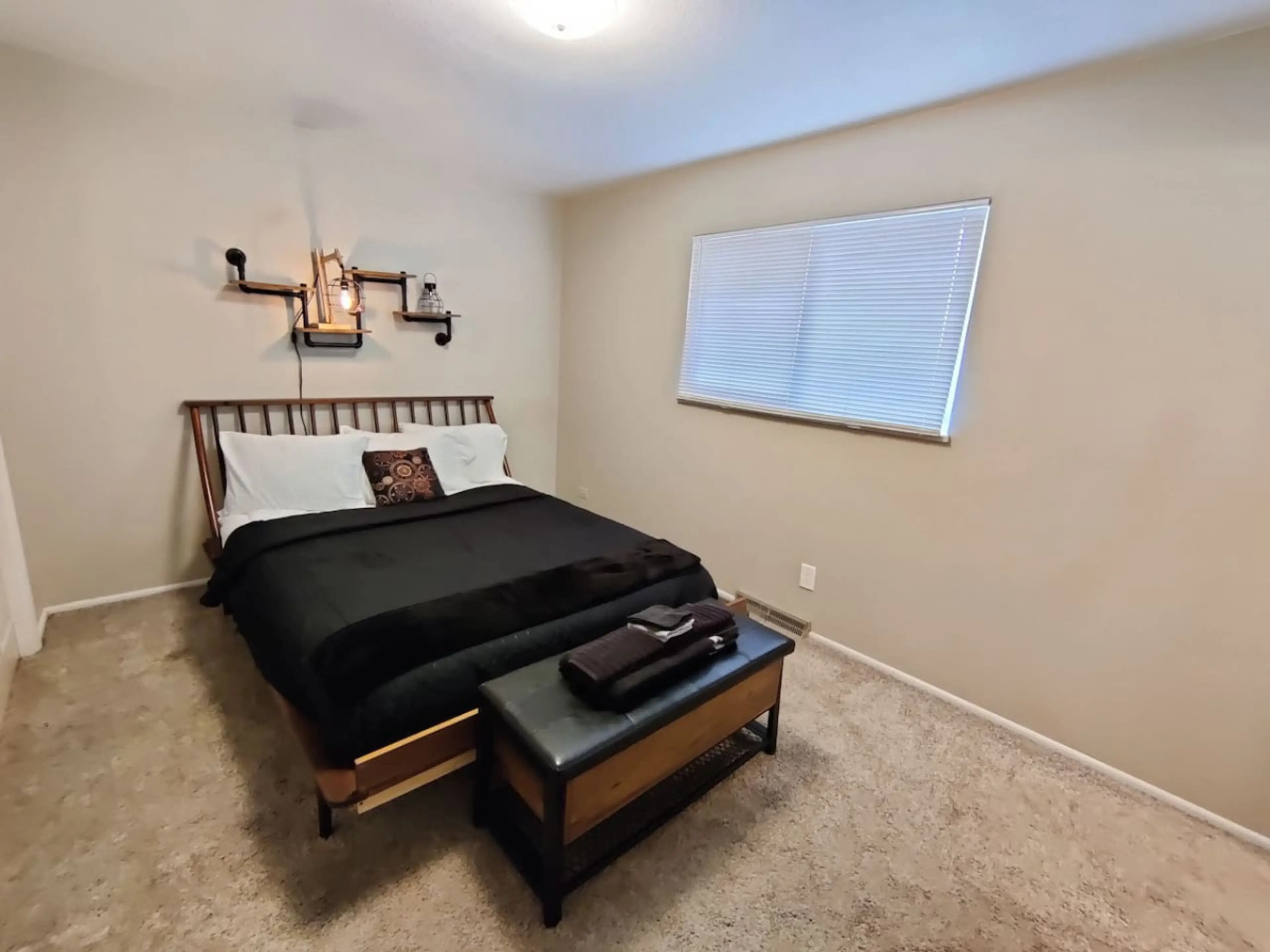 This comfortable queen bedroom has an ensuite bathroom.