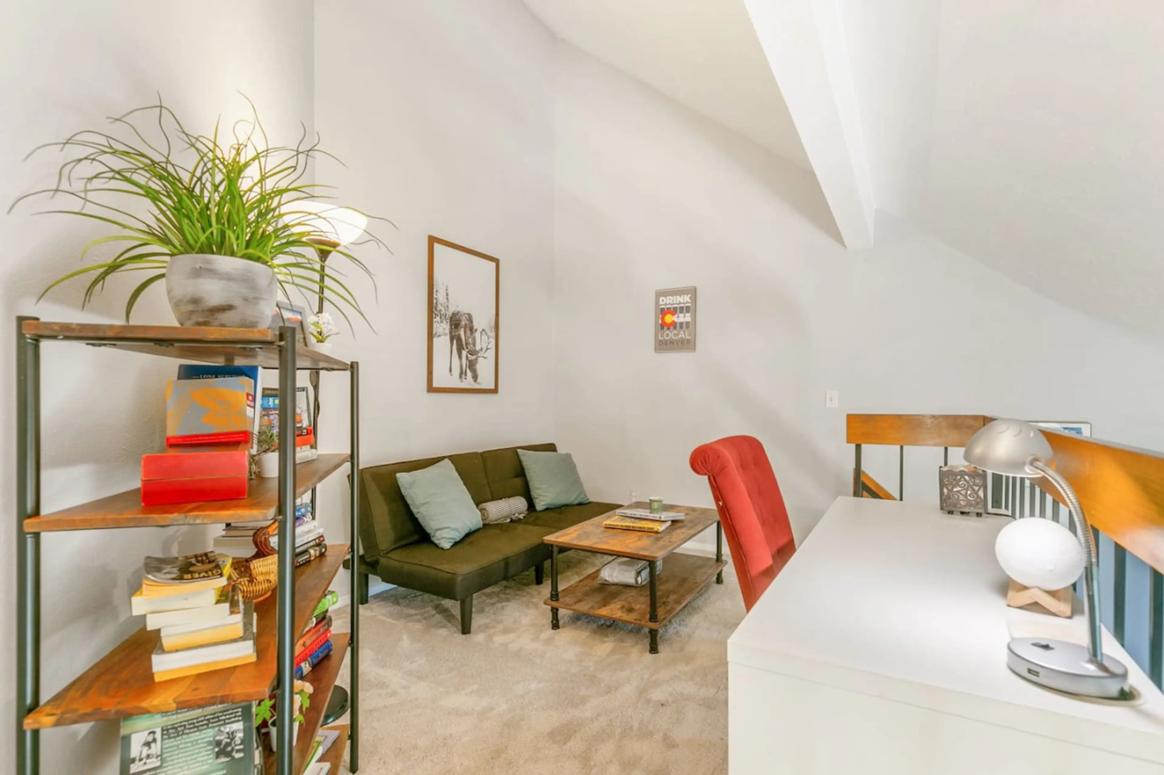 A dedicated loft workspace area for those who work while traveling.