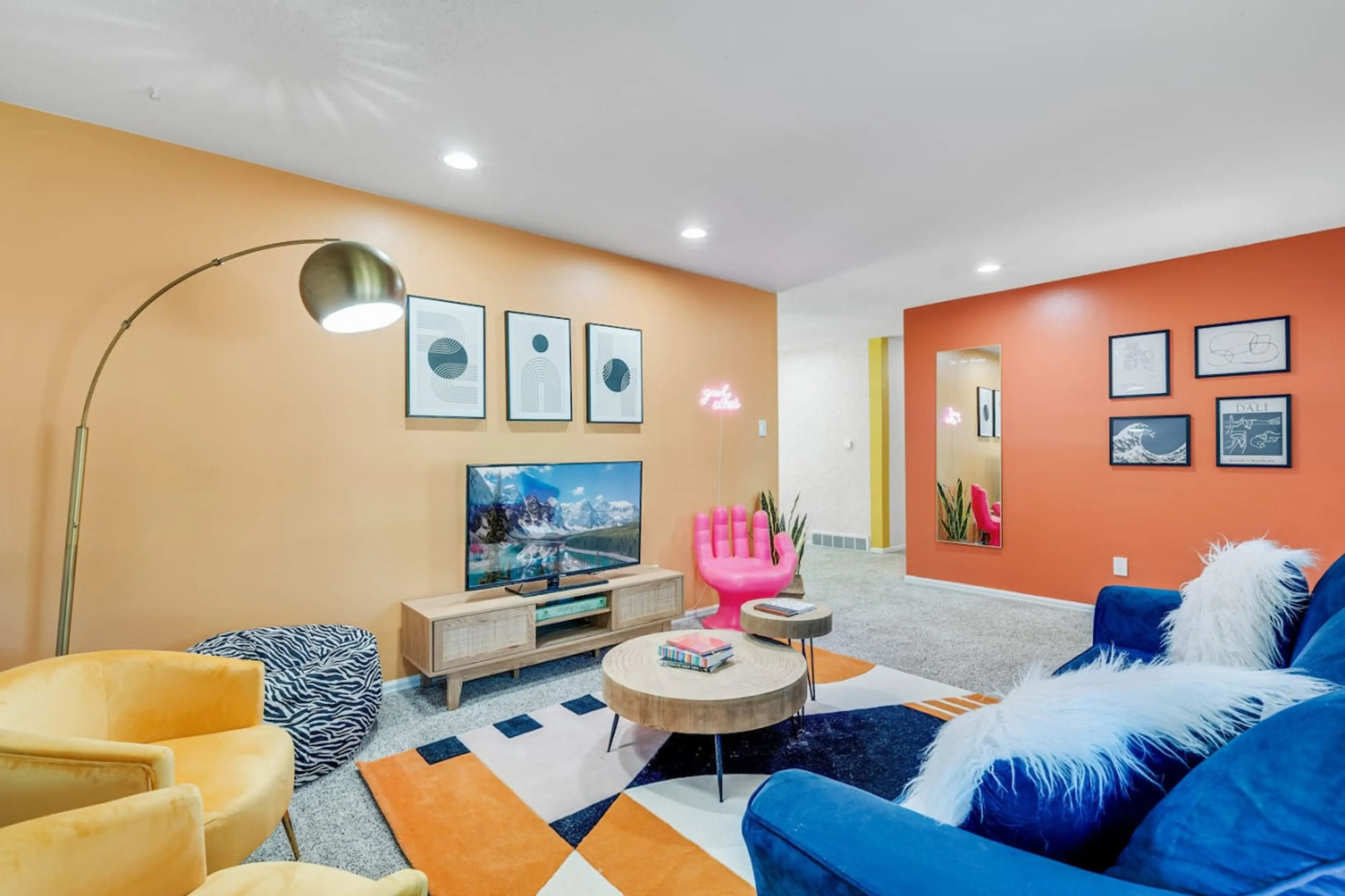 Gather around  in this beautifully furnished living room  for movie marathon.