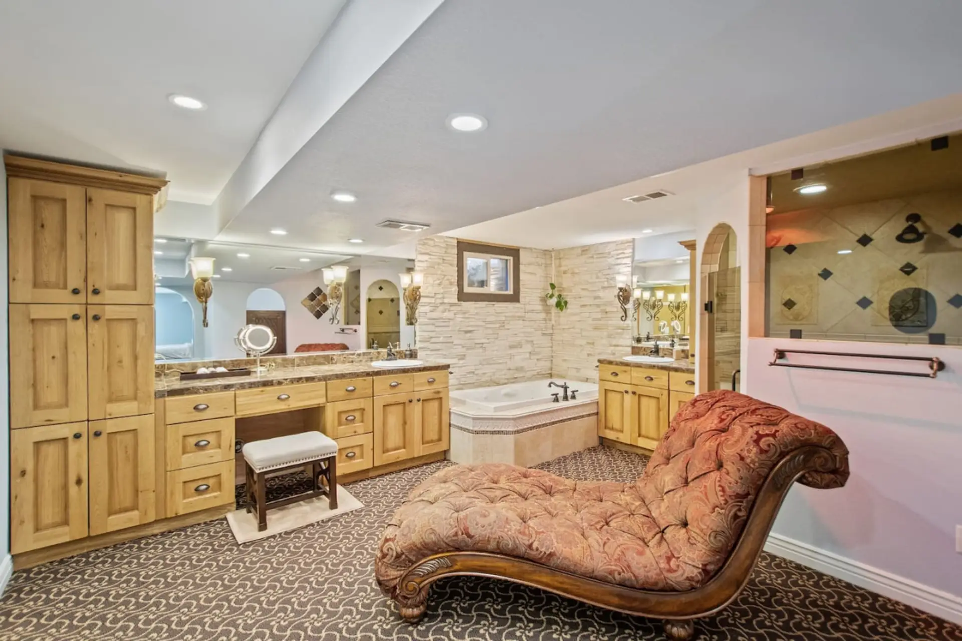Feel relaxed, refreshed, and recharged in this spacious bathroom.