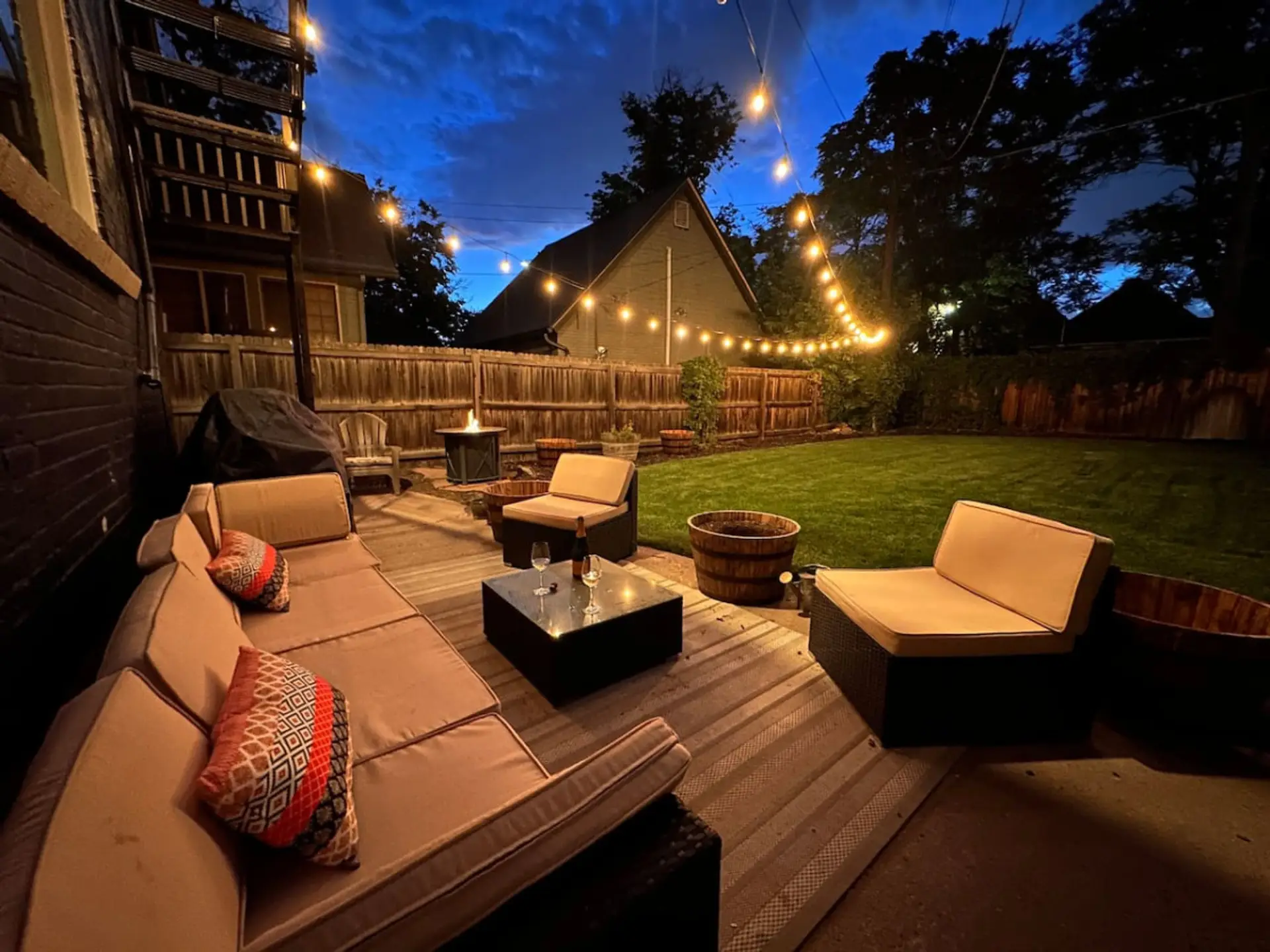 Imagine relaxing on this beautiful patio, surrounded by friends, warmth from the fire pit, and laughter filling the air.