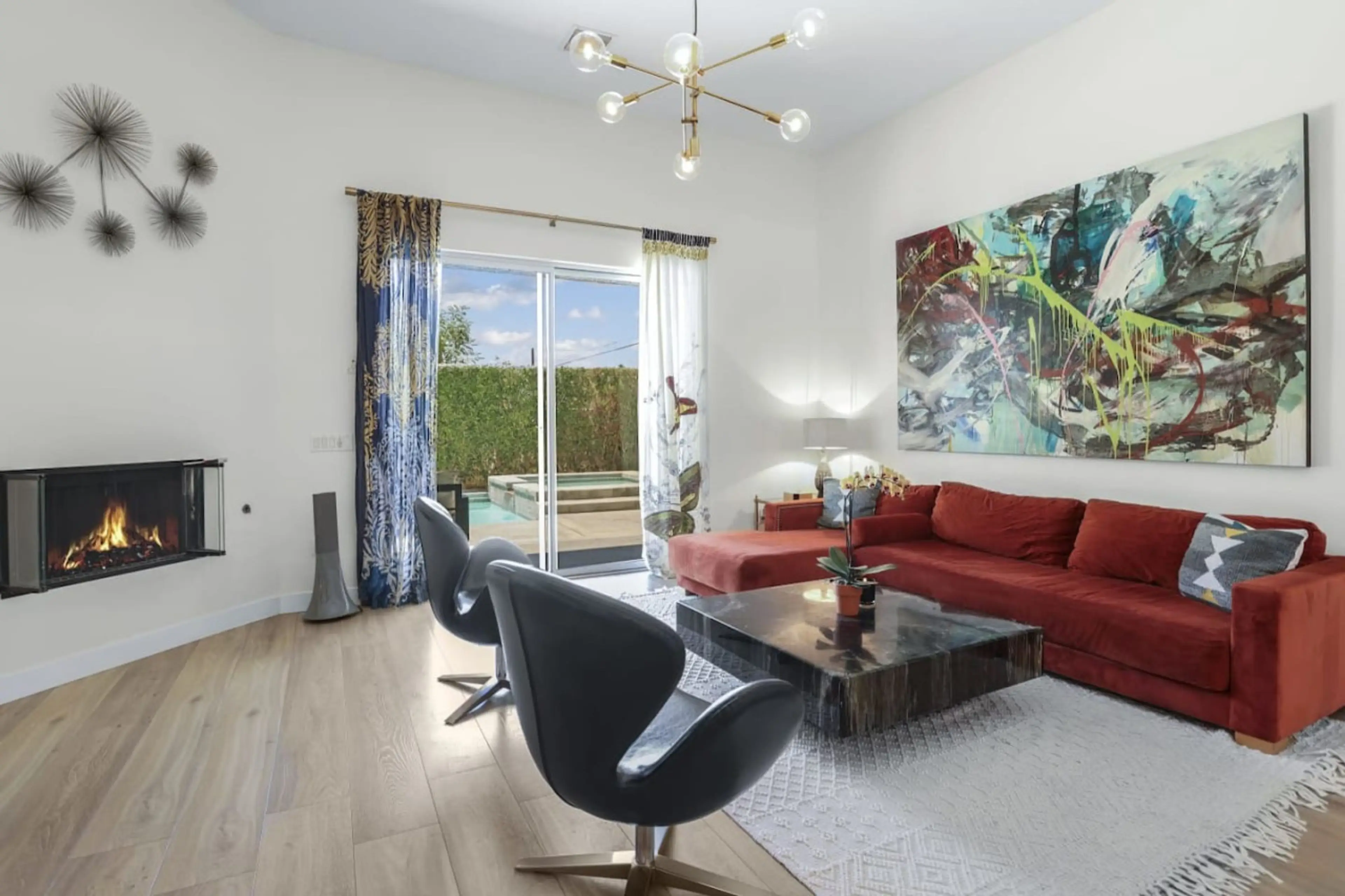 A perfect living space with a blend of bold elegance and cozy warmth—relax, unwind, and enjoy the ambiance!