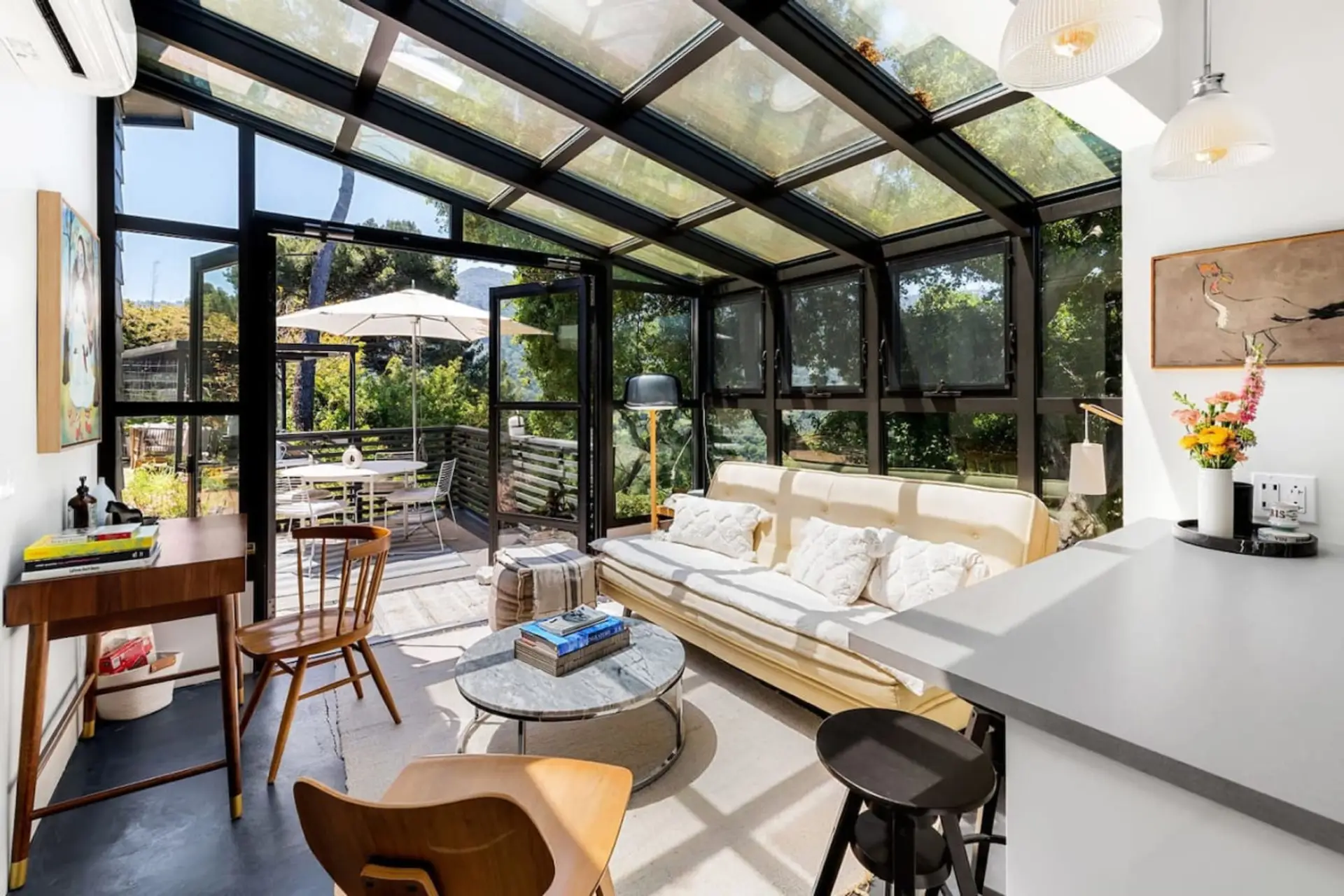 Featuring plush seating and abundant natural light for a cozy, inviting ambiance.