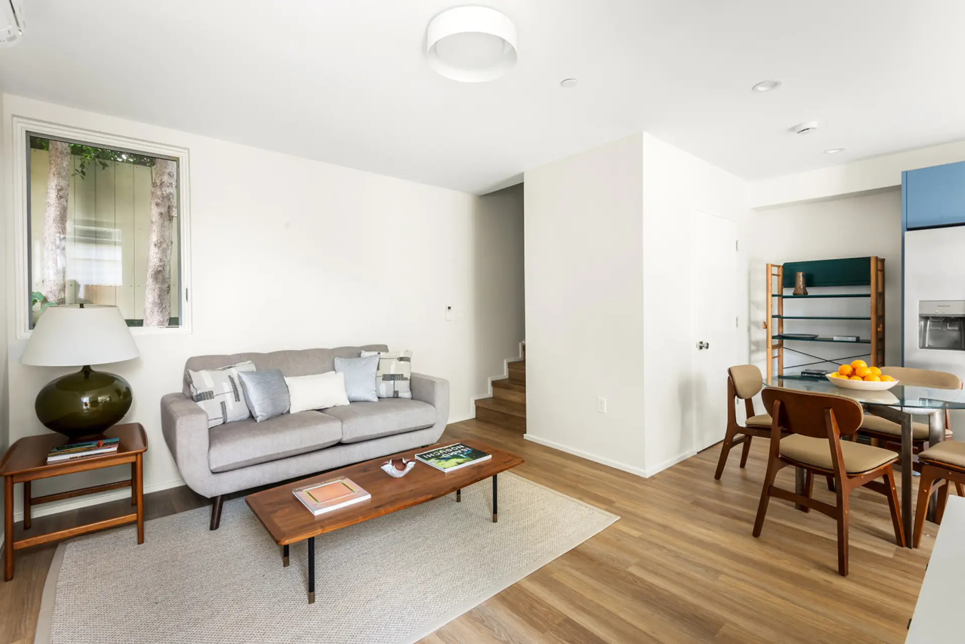 Relax in this thoughtfully designed living room with mid-century touches.