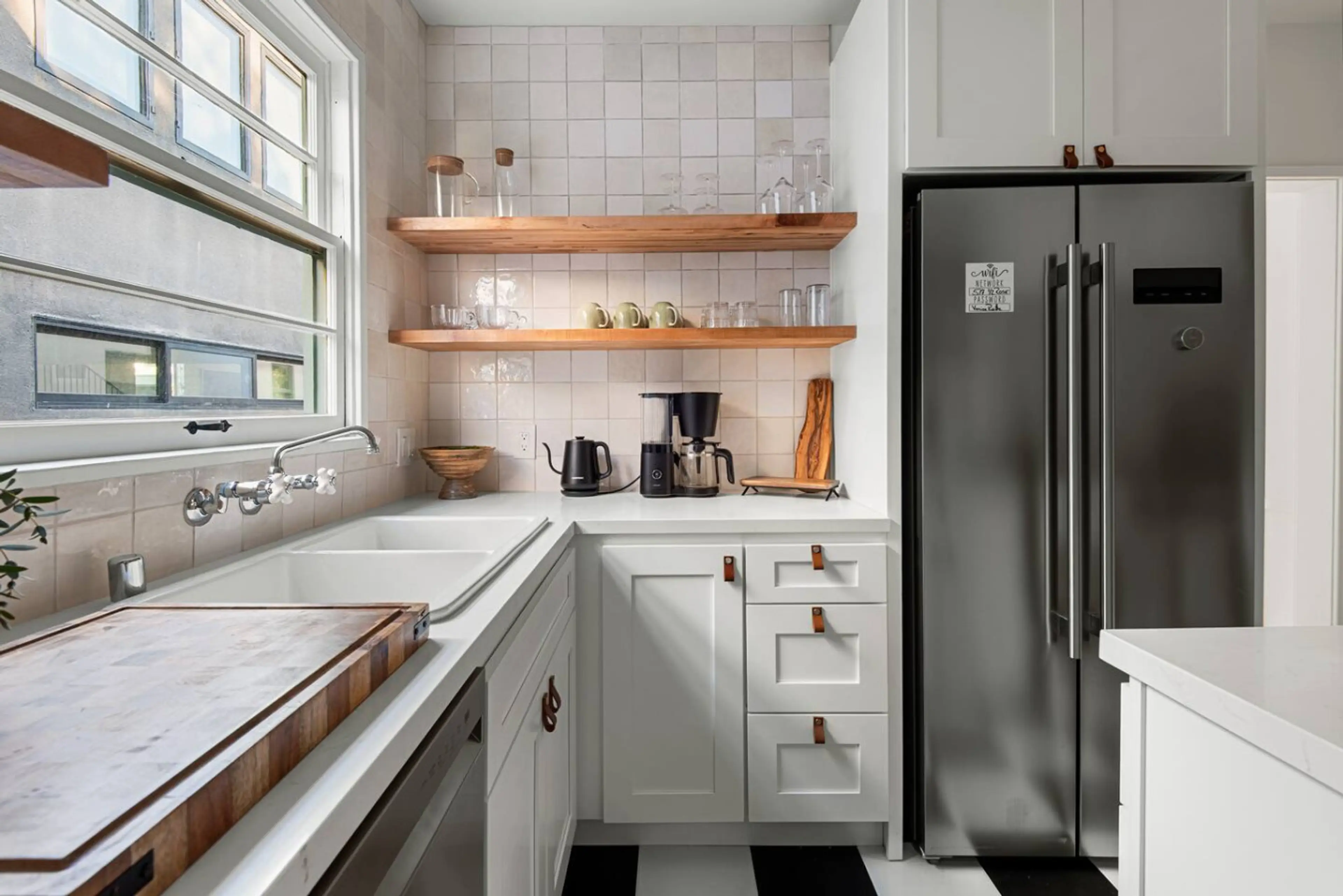 Thoughtfully stocked kitchen with utensils, cookware, and basics for your convenience.