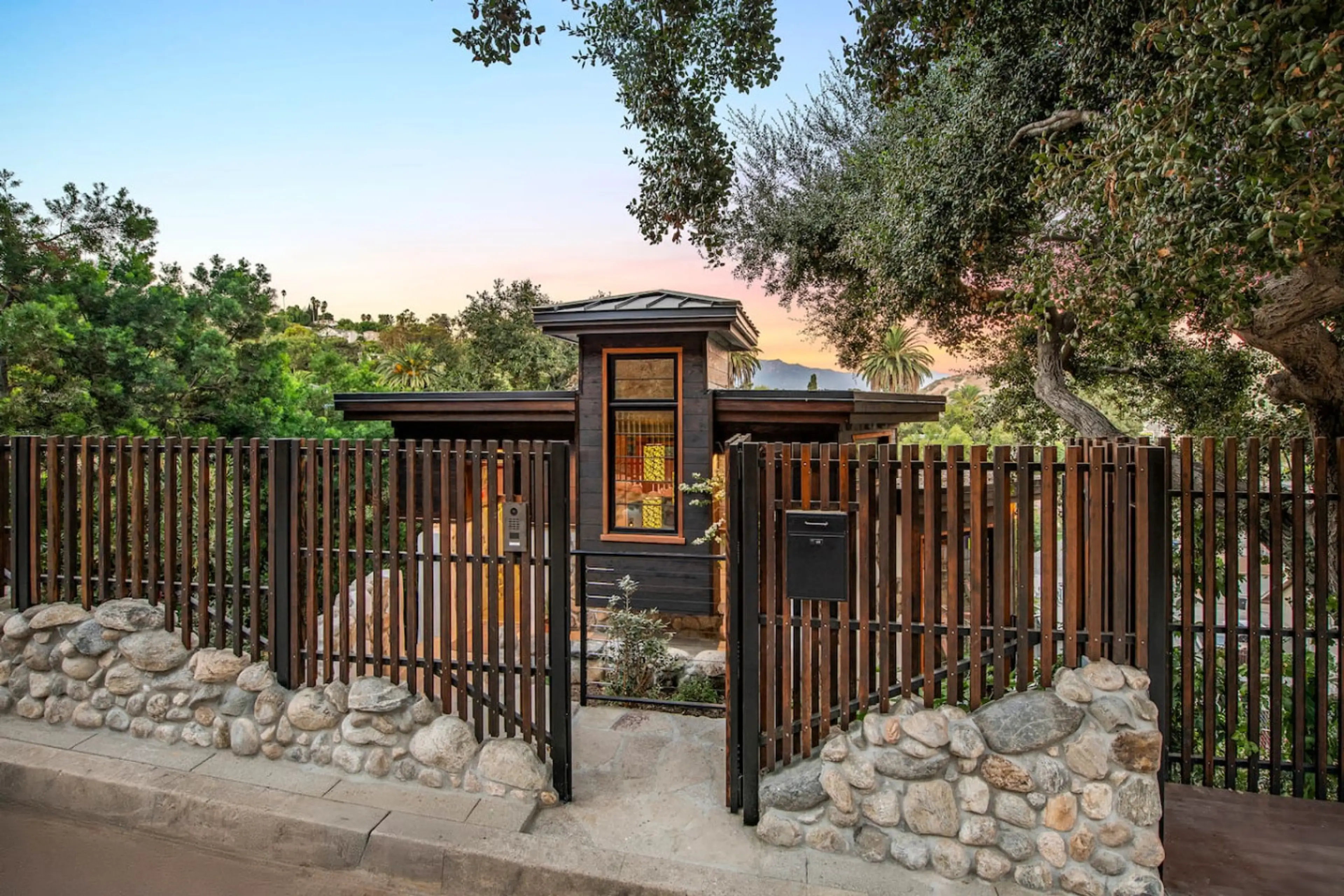 A rare Mount Washington hideaway tucked into the hillside beneath a beautiful oak tree