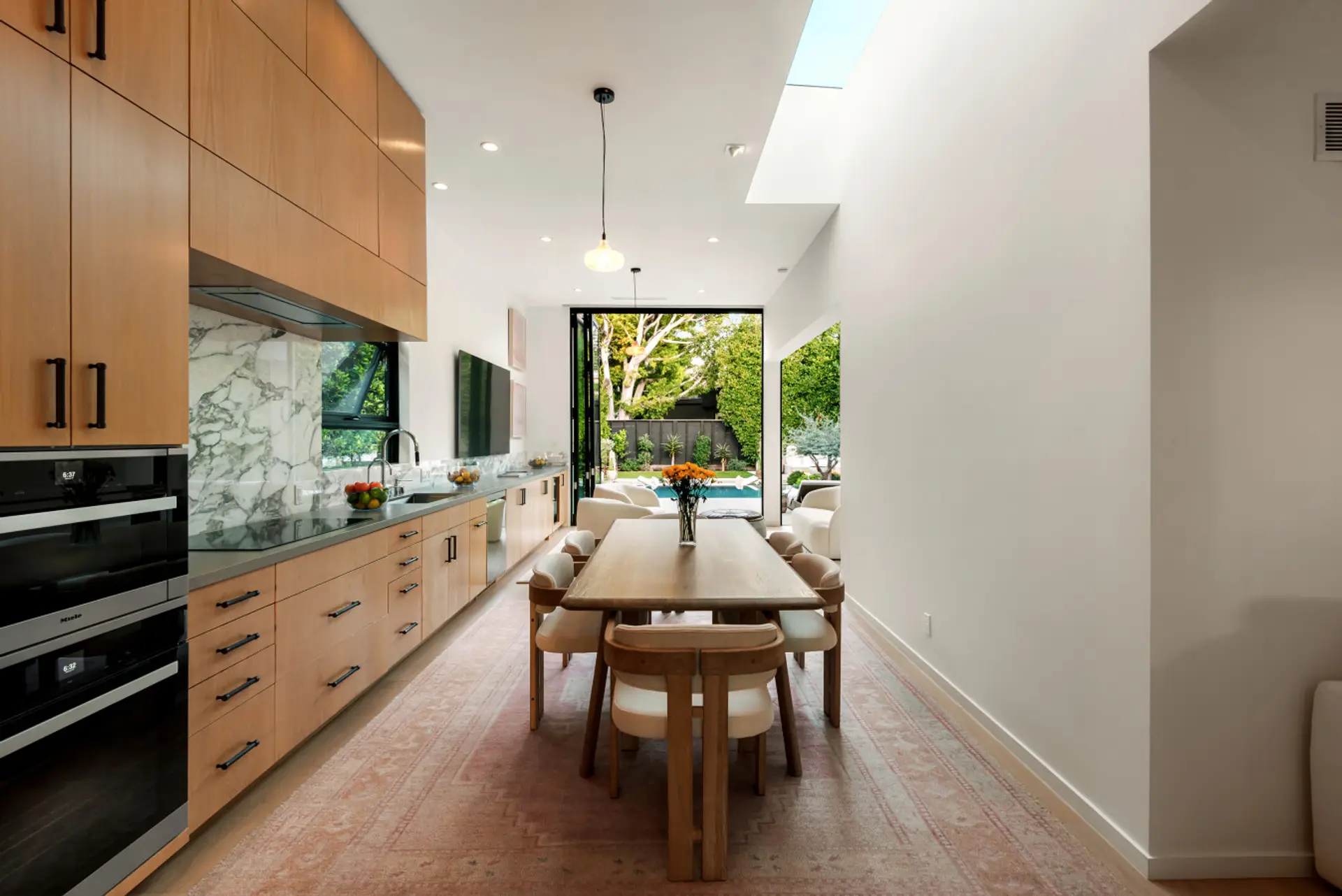 Bright, spacious dining area with a 6-seater table perfect for gatherings.
