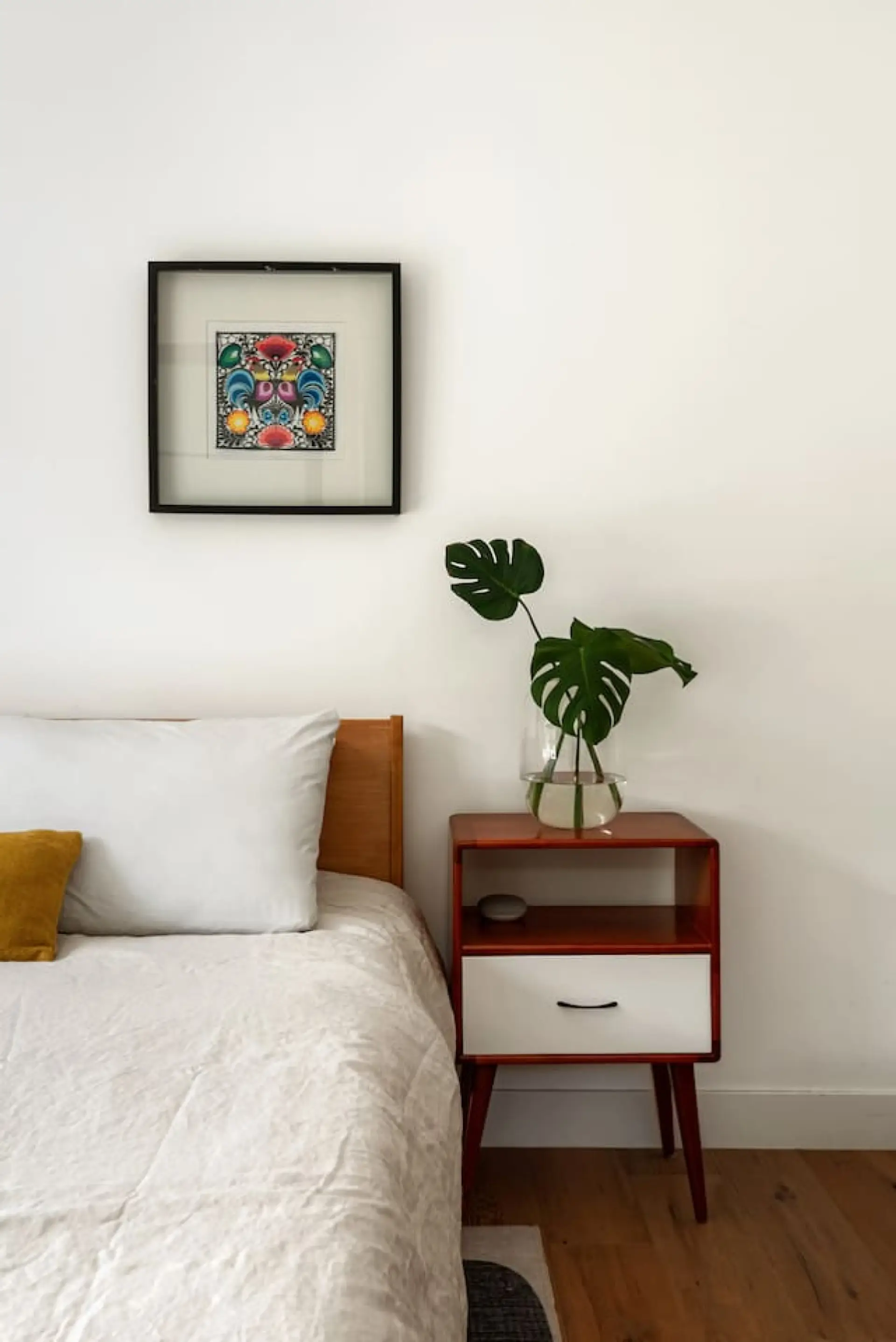 Bright and calming bedroom detail with natural light and thoughtful design touches