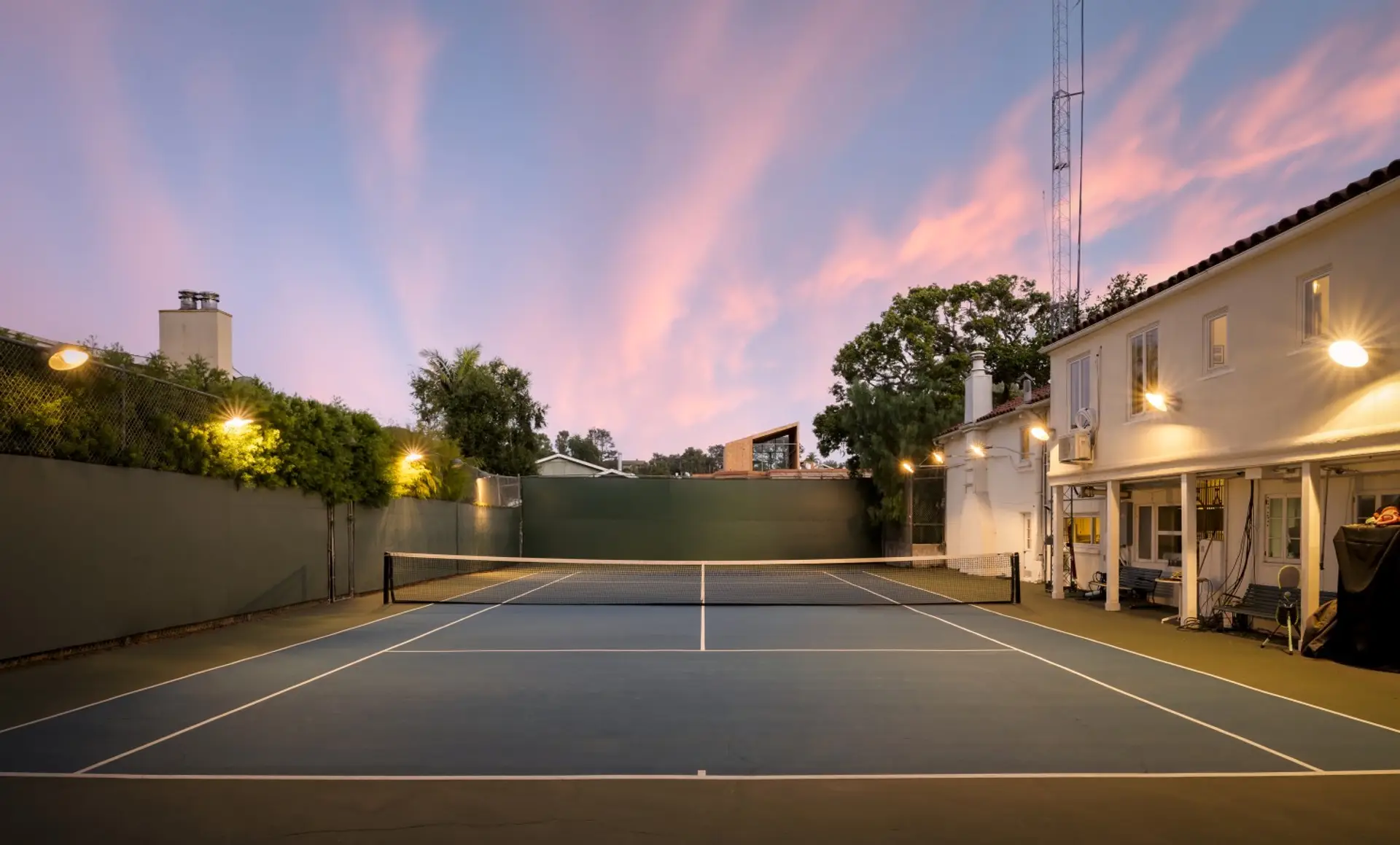 Private tennis court, lit for evening play Vrbo caption: Enjoy a match under the stars on your own private tennis court