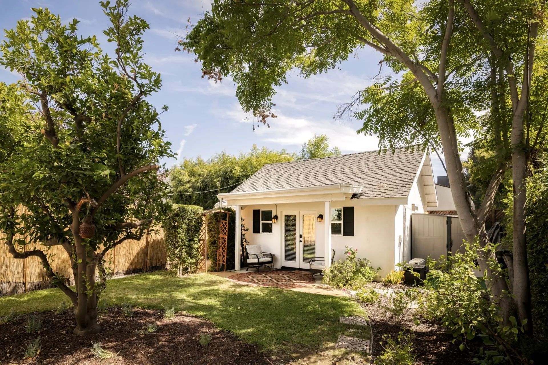 Your private garden getaway begins here, tucked behind a locked gate and fenced walkway.