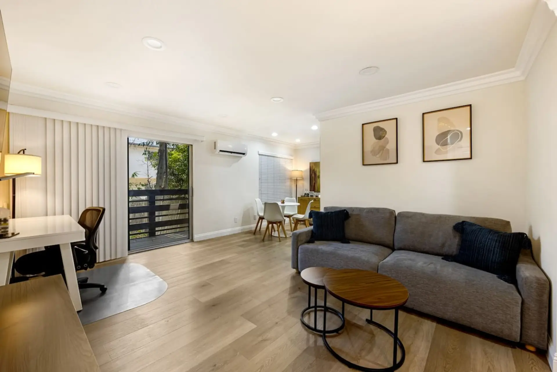 Bright, open living space with a queen sleeper sofa, perfect for stretching out or hosting a second guest.