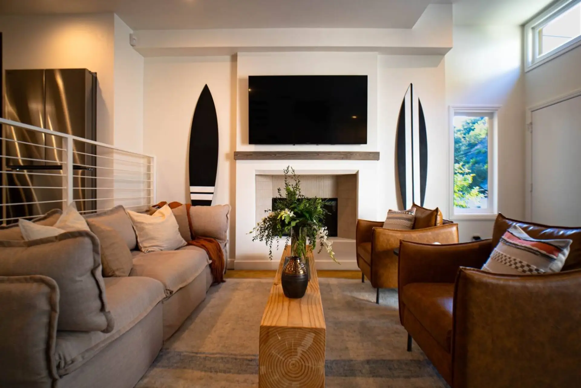 Open sightlines into the kitchen and dining make this the heart of the home