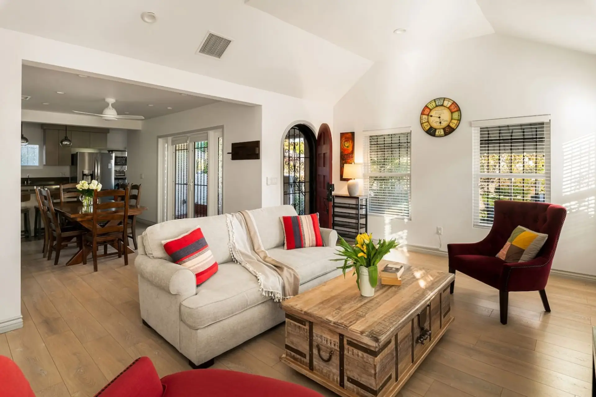 Sunny, open, and made for hanging out, with the kitchen and dining table right there
