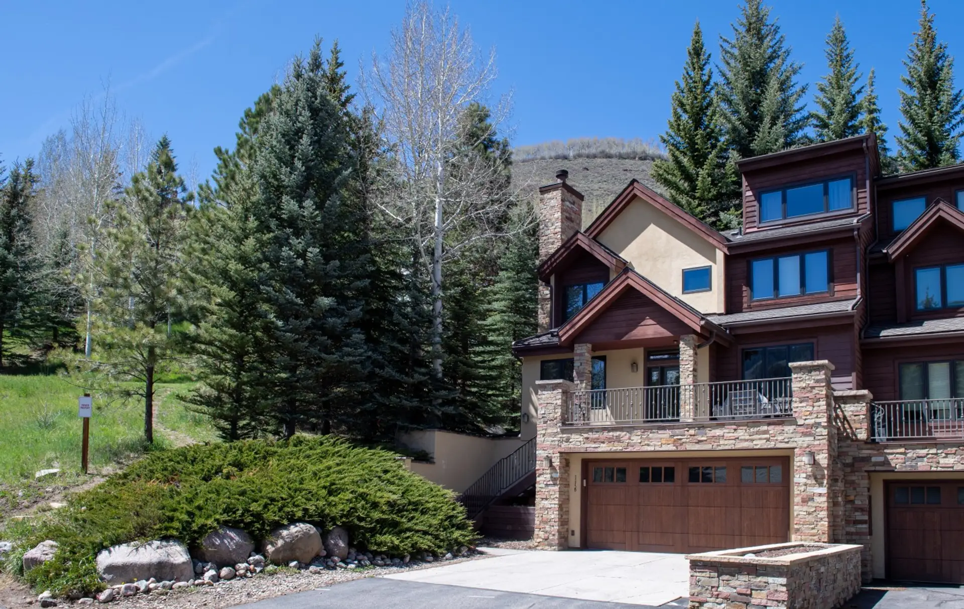 Sunlight pours through south facing windows, framing Vail Mountain in every room. Step onto the patio above the garage and feel the mountain air. Home, with the ski area as your view.