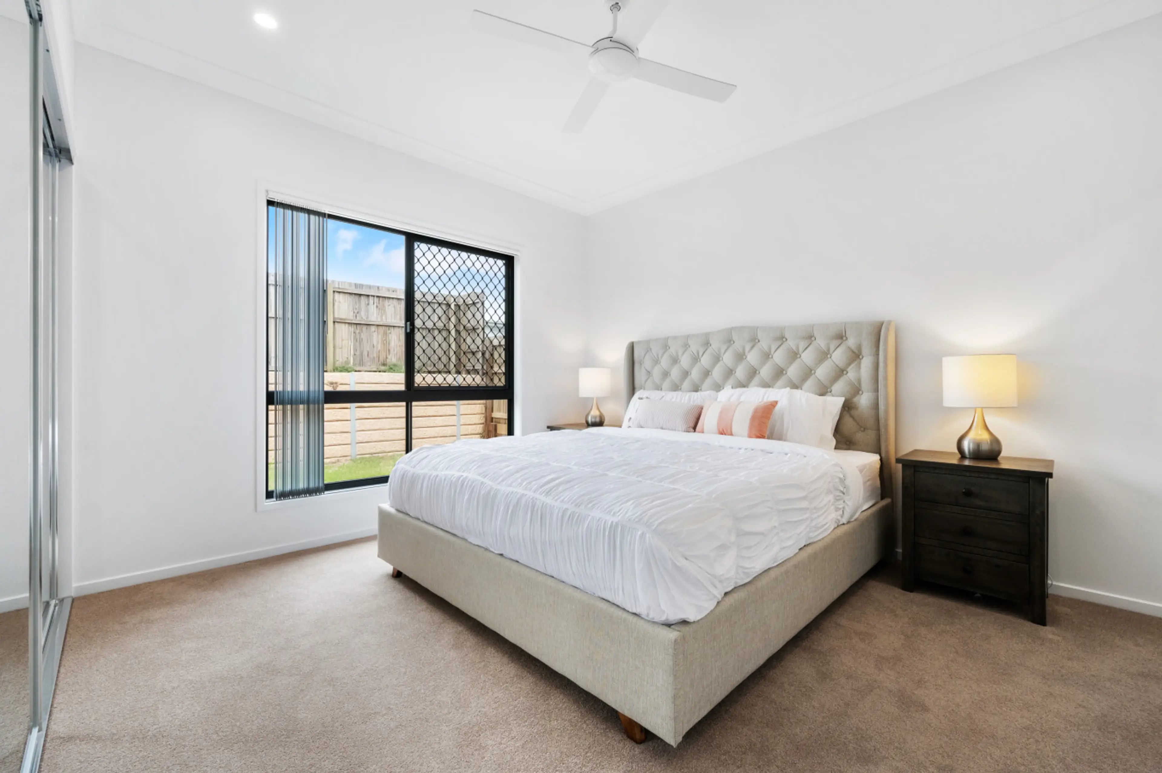 Relax in comfort and style in the main bedroom at 'The Crest' in this King bed