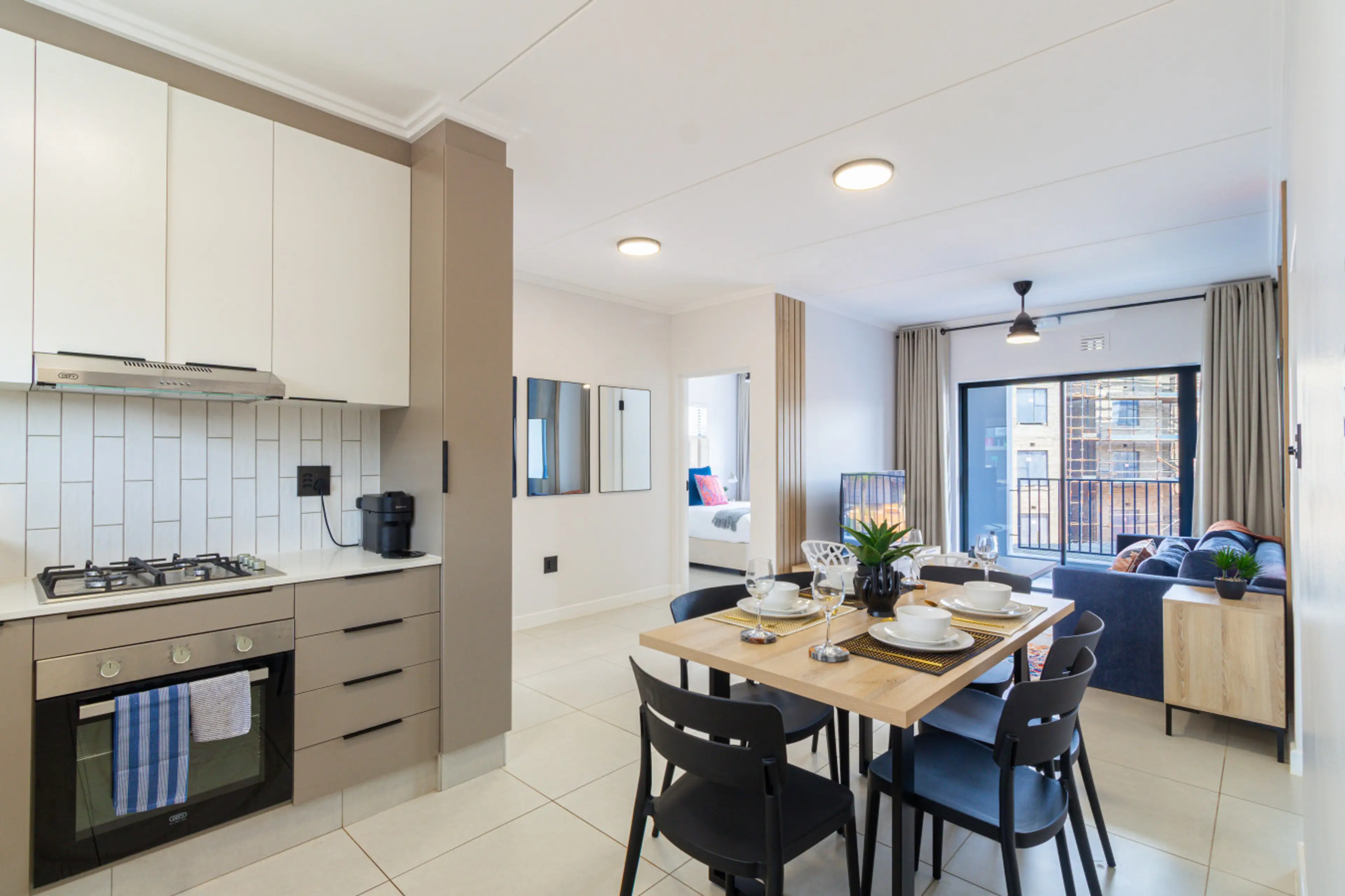 Open-plan living, dining and kitchen area leading out to the garden