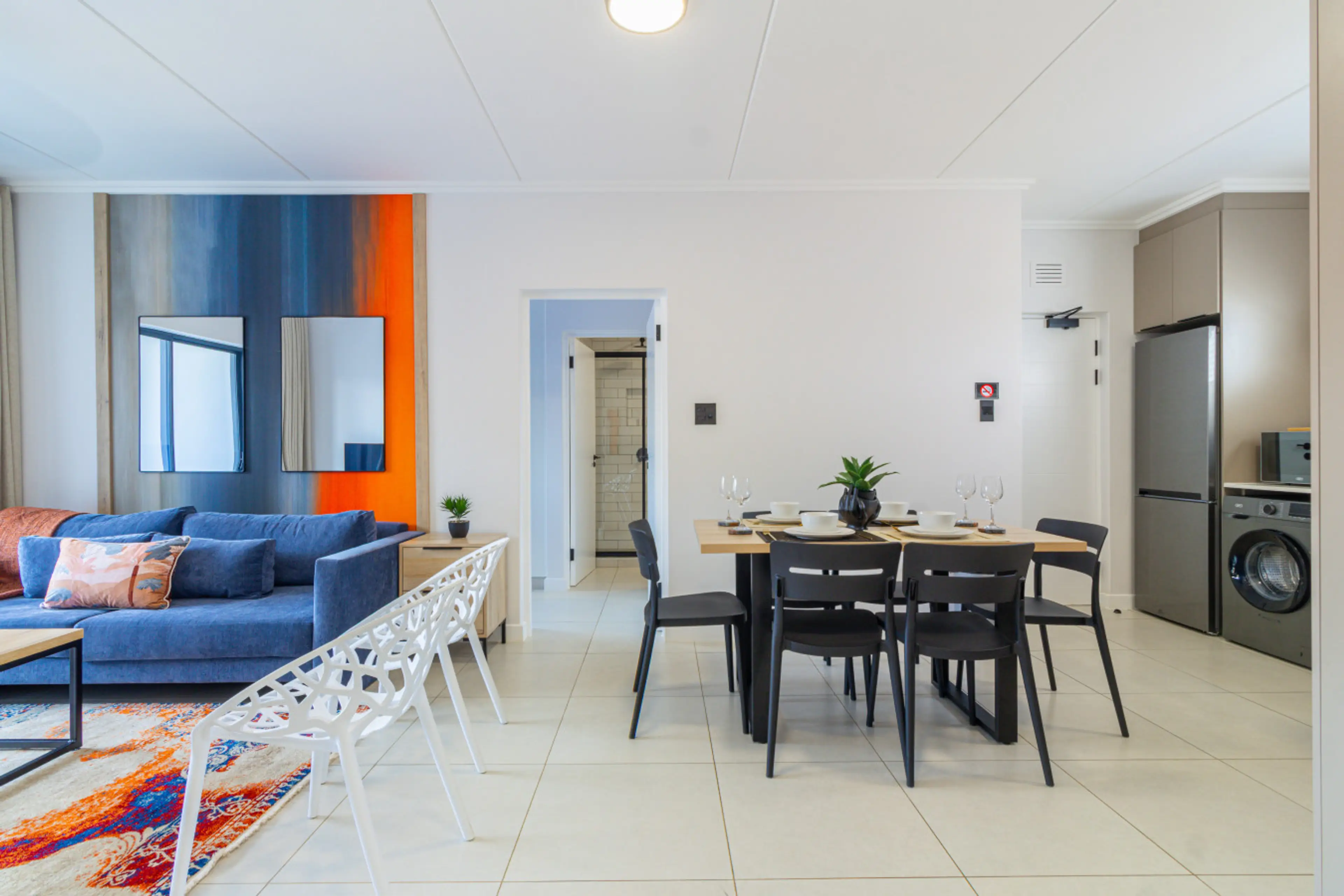 Open-plan living, dining and kitchen area leading out to the garden