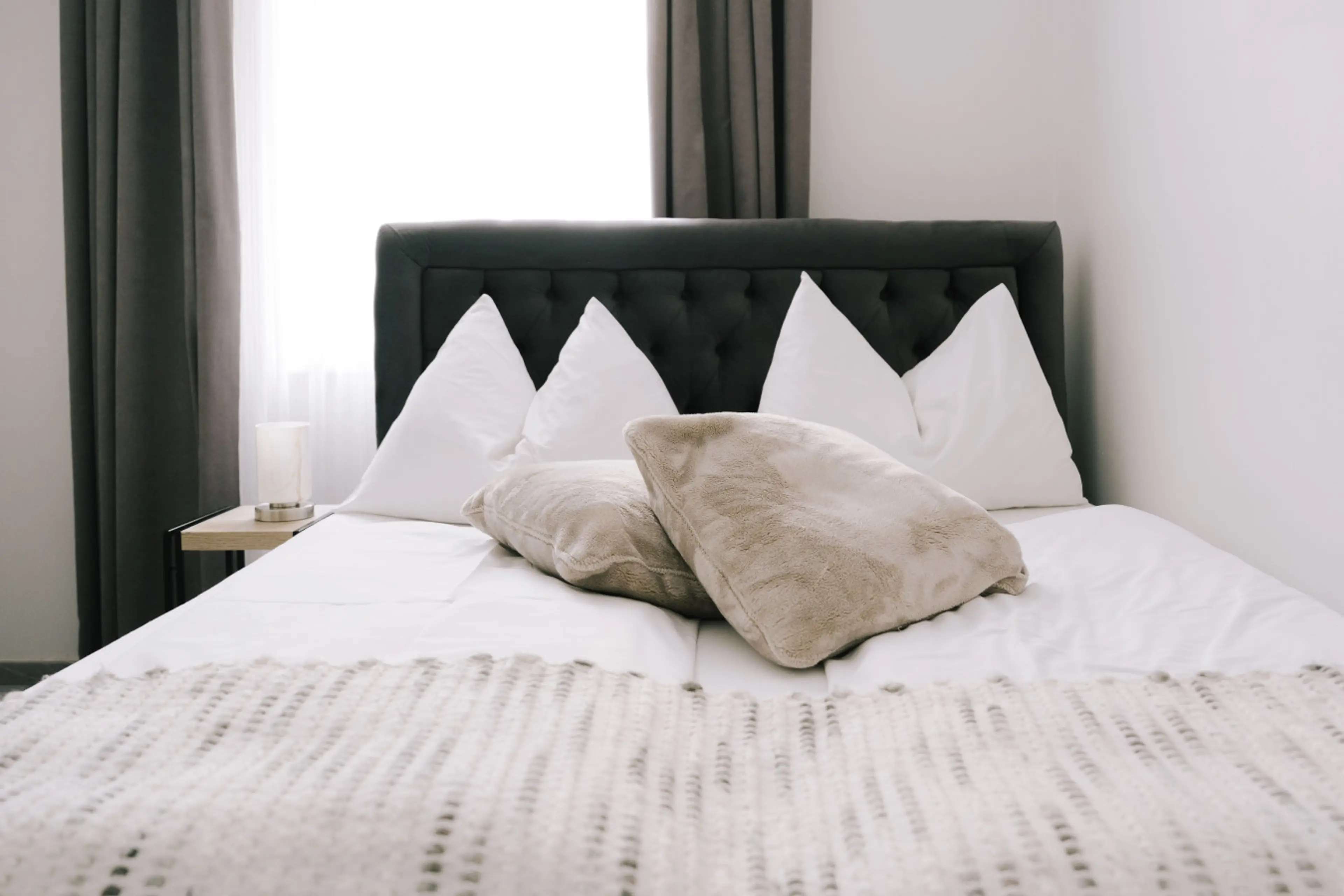 Rest easy after exploring Vienna. Our hotel-quality bed features a premium mattress, crisp linens, and plush pillows for a perfect night's sleep.